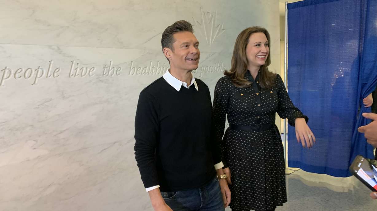 Ryan Seacrest and his sister Meredith Seacrest Leach speak with reporters before the opening of the Seacrest Studio at Primary Children's Hospital in Salt Lake City on Tuesday.