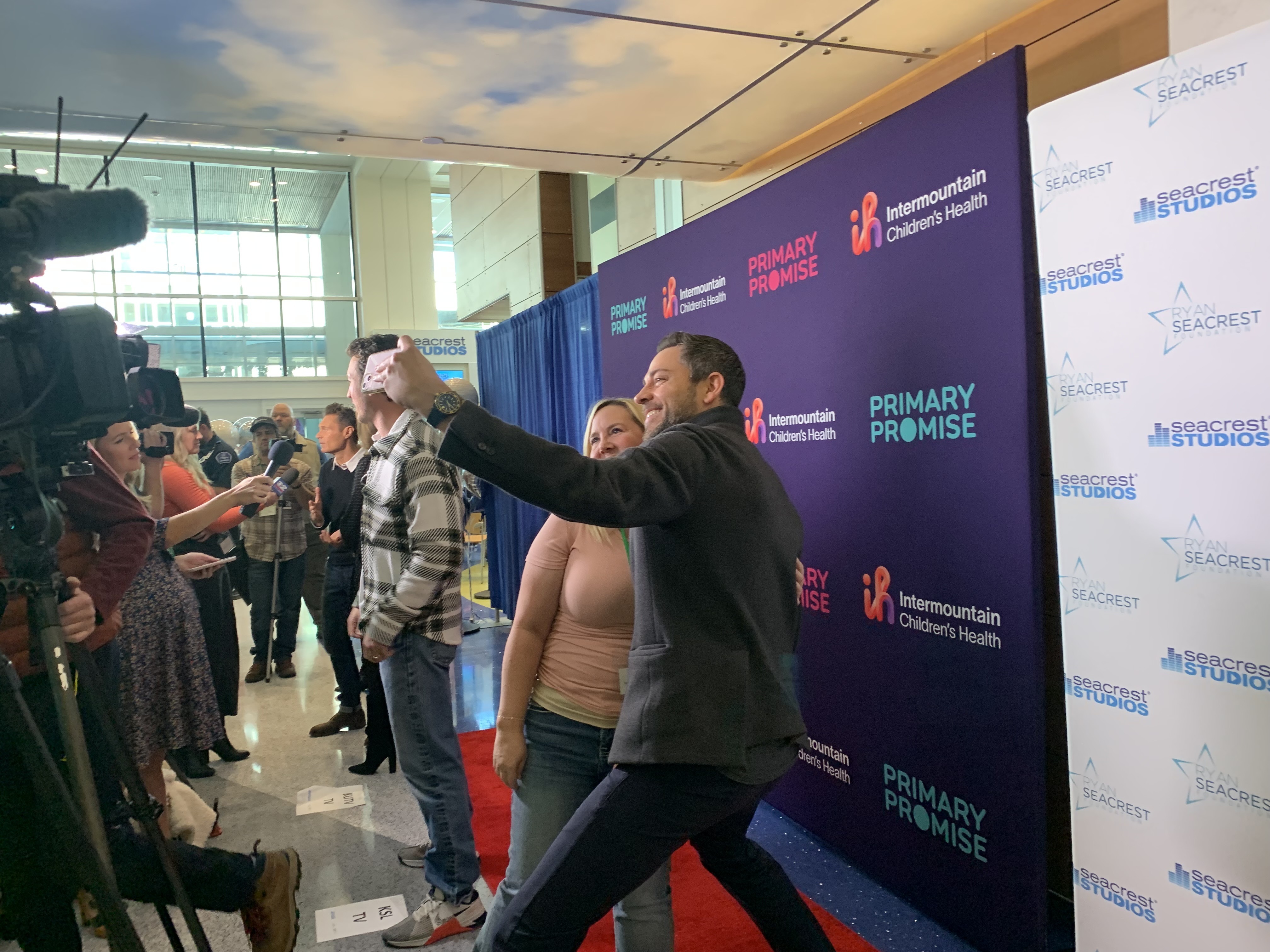 Zachary Levi, an actor, takes a selfie with an Intermountain Health employee Tuesday prior to the grand opening of the Secreast Foundation's newest Seacrest Studio, located inside Primary Children's Hospital in Salt Lake City.