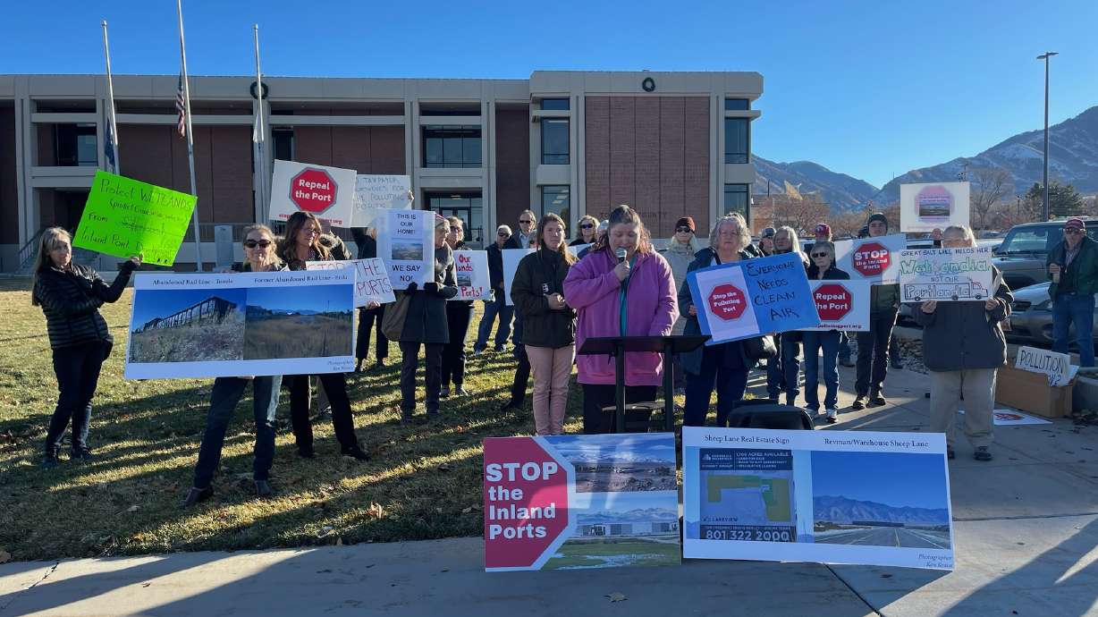 Teri Durfee with the Stop the Polluting Ports Coalition, speaks at a protest against two Utah Inland Port Authority project areas in Tooele County. The port authority's board of directors voted unanimously to approve the project areas.
