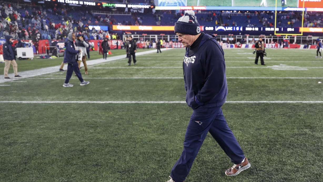 New England Patriots head coach Bill Belichick walks off the field after a 6-0 loss to the Los Angeles Chargers following an NFL football game, Sunday, Dec. 3, 2023, in Foxborough, Mass.
