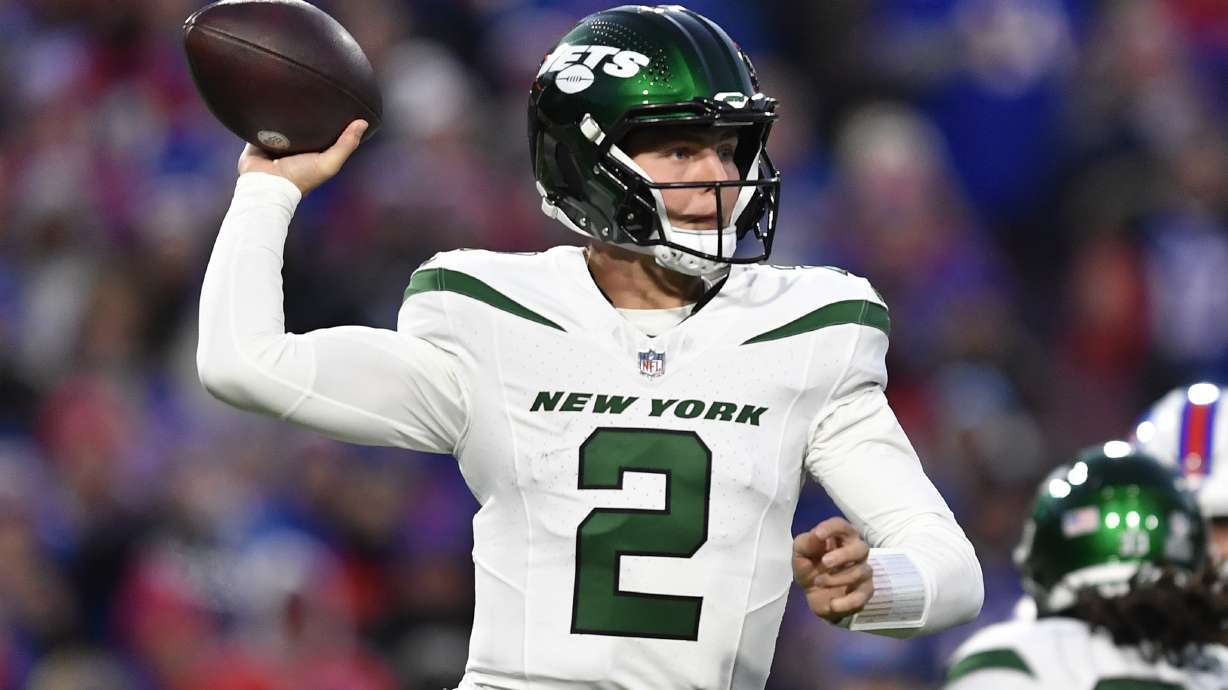 New York Jets quarterback Zach Wilson (2) looks to throw a pass during the first half of an NFL football game against the Buffalo Bills in Orchard Park, N.Y., Sunday, Nov. 19, 2023.