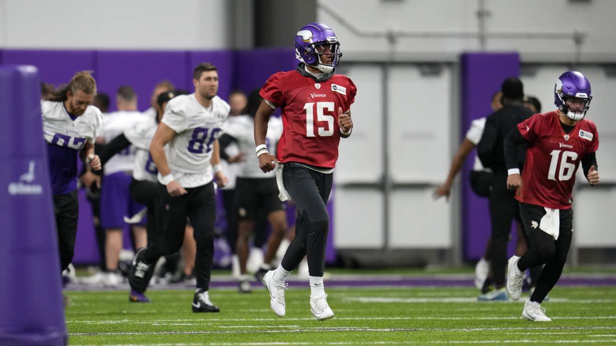 Minnesota Vikings quarterback Joshua Dobbs (15) takes part in drills during NFL football practice in Eagan, Minn., Monday, Dec. 4, 2023.