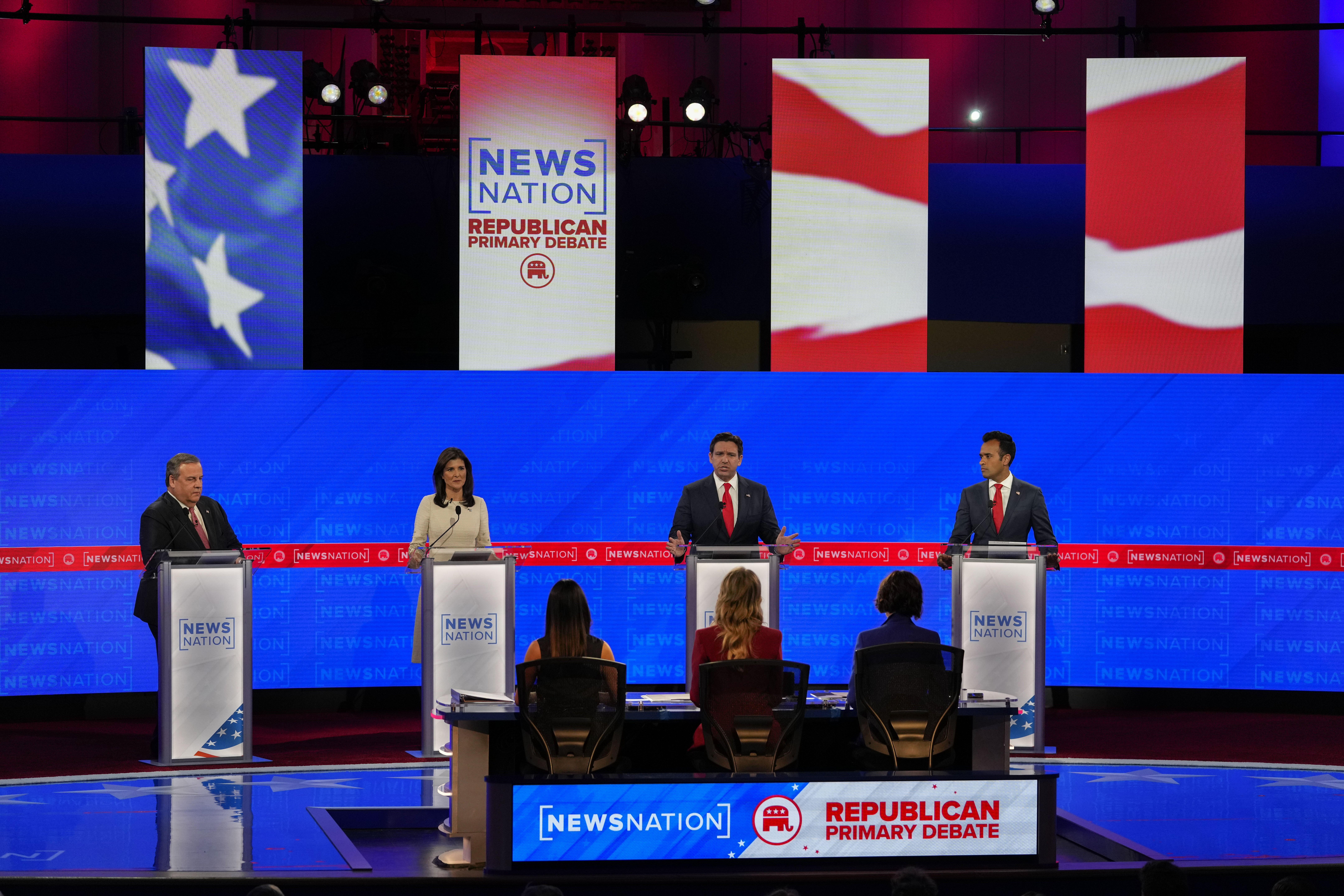 Republican presidential candidate Florida Gov. Ron DeSantis, third from left, speaks as former New Jersey Gov. Chris Christie, left, former U.N. Ambassador Nikki Haley and businessman Vivek Ramaswamy, right watch during a Republican presidential primary debate hosted by NewsNation on Wednesday at the Moody Music Hall at the University of Alabama in Tuscaloosa, Ala.