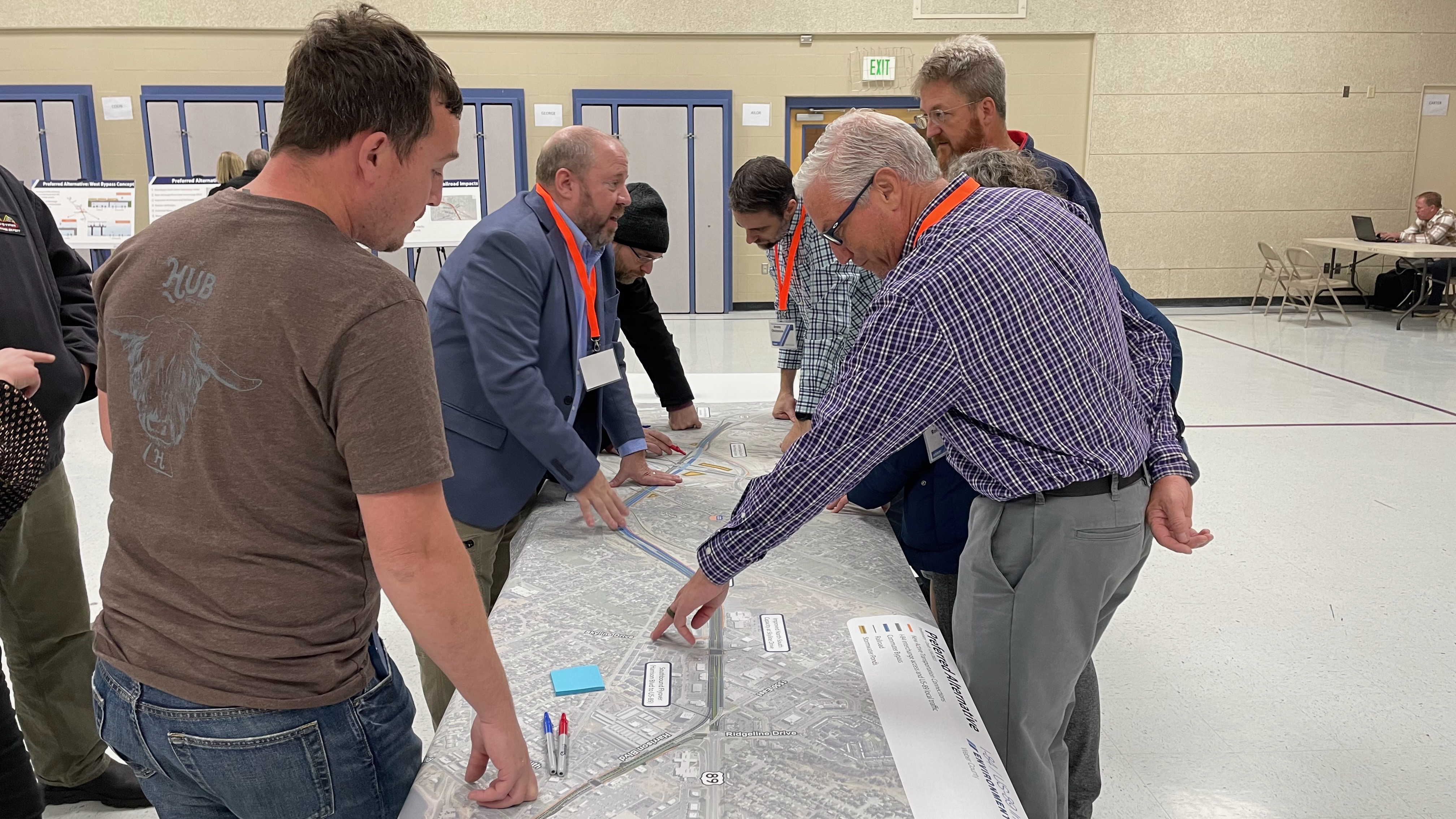 Mike Romero, right, a Utah Department of Transportation study manager, discusses a proposed upgrade to the U.S. 89/I-84 intersection at a meeting in South Weber on Dec. 6. The proposal could cost around $700 million.