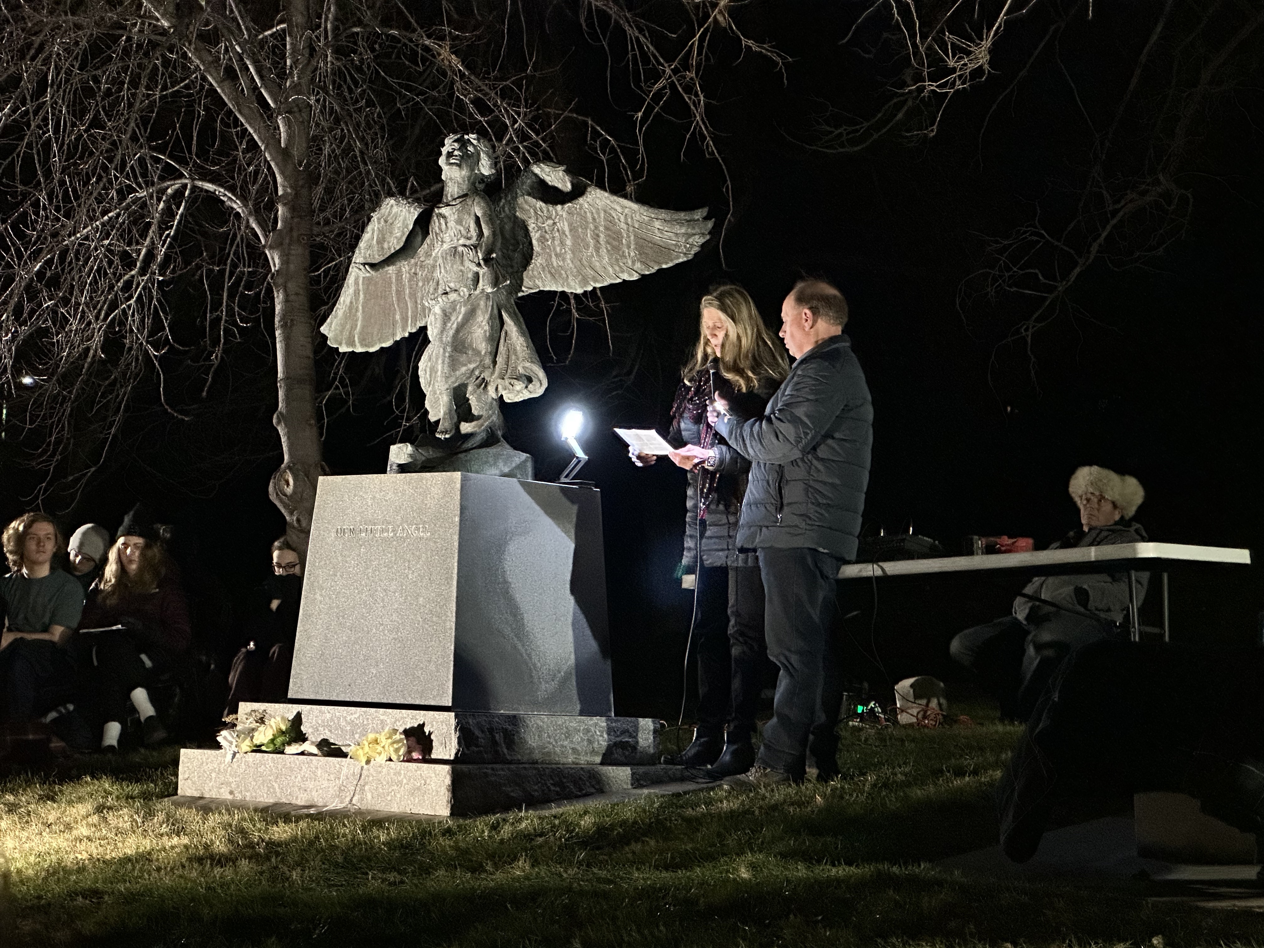 Diane and Robert Glad speak at the annual Christmas Box Angel vigil in the Salt Lake City Cemetery Wednesday, sharing memories of their son who died in July.