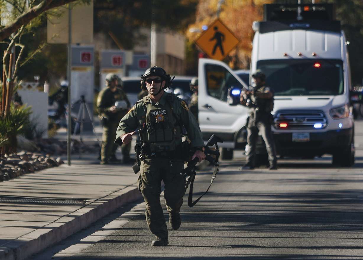 A police officer works the scene of a shooting on the University of Nevada, Las Vegas campus on Wednesday in Las Vegas.