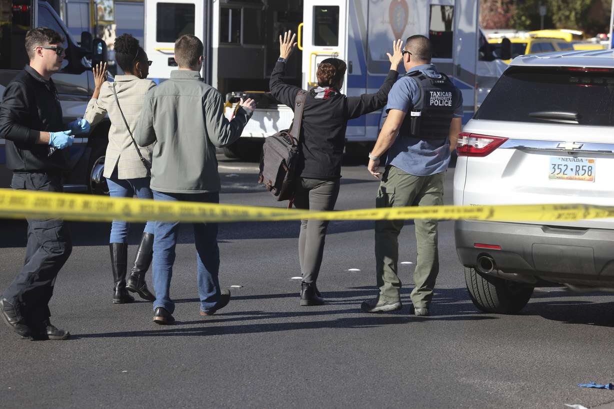 Police work at the scene of a fatal shooting that killed several people on the University of Nevada, Las Vegas campus on Wednesday in Las Vegas.