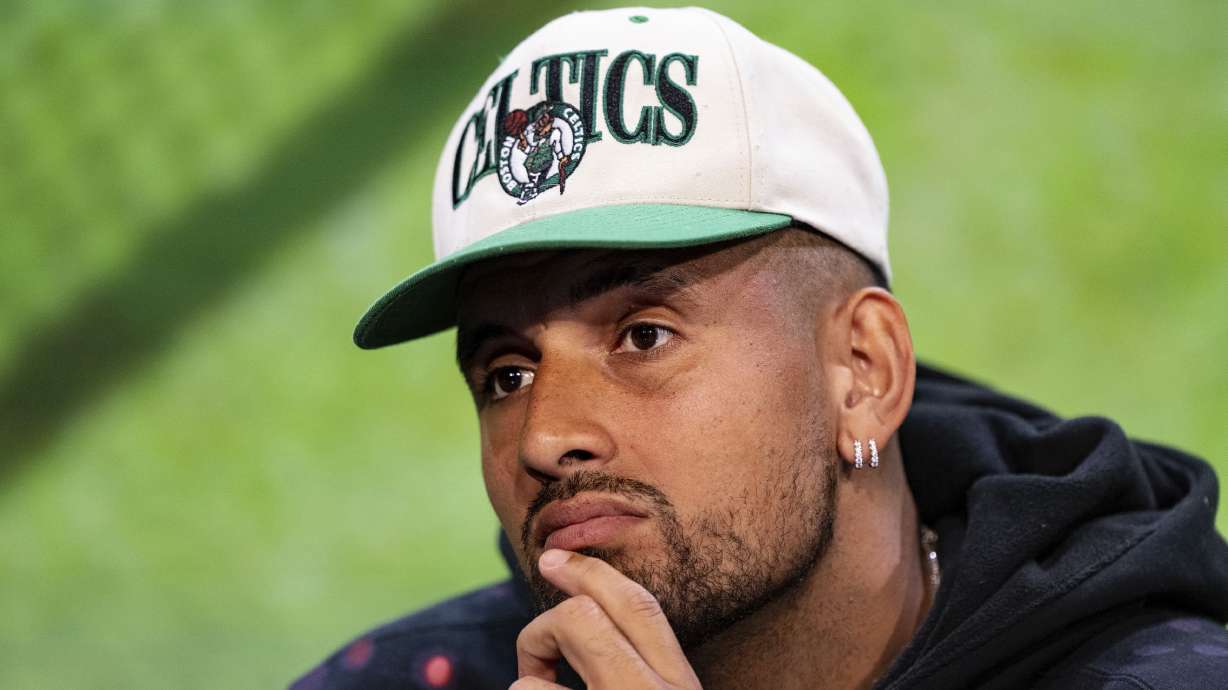 FILE - Australia's Nick Kyrgios listens during a pre-tournament press conference at the All England Lawn Tennis and Croquet Club in Wimbledon, south west London, Sunday July 2, 2023. Kyrgios, the runner-up at Wimbledon in 2022, is setting up a free-to-access OnlyFans page.