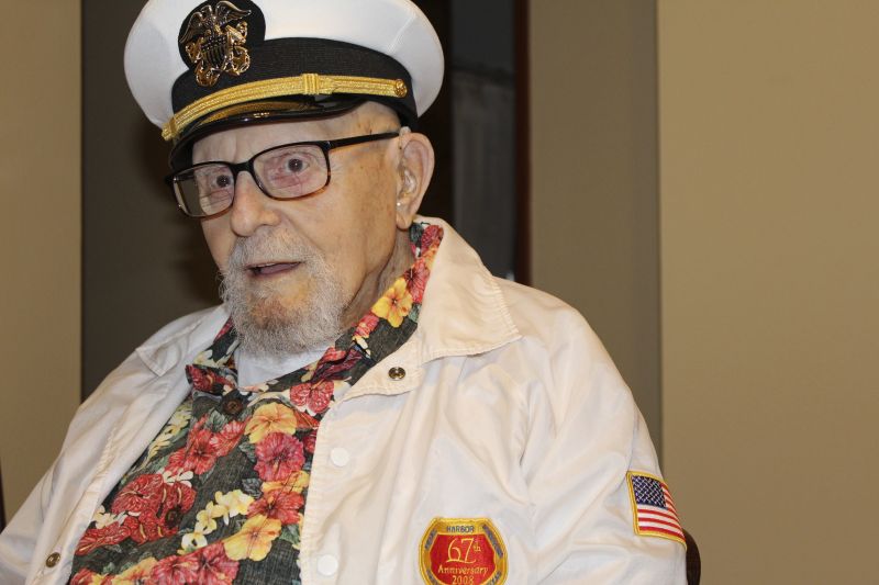Pearl Harbor survivor Ira "Ike" Schab, 103, wears a U.S. Navy cap as he sits at the kitchen table in his home in Beaverton, Ore. on Nov. 20. Schab was in the Navy and on the USS Dobbin during the Pearl Harbor attacks on Dec. 7, 1941.