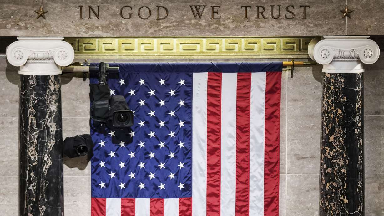“In God We Trust” is engraved in stone in the House of Representatives chamber at the Capitol in Washington. The city council of Orem recently voted to adopt "In God We Trust" as its official motto.