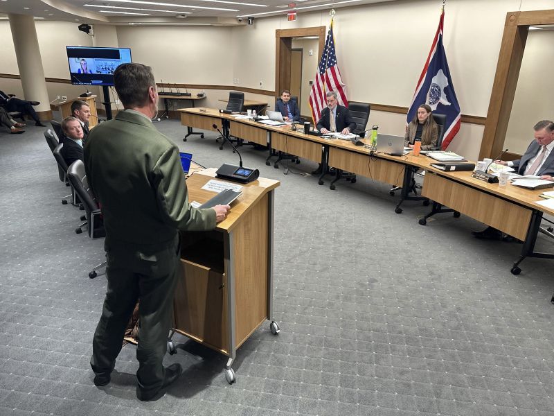 Grand Teton National Park Superintendent Palmer Chip Jenkins, Jr., addresses Wyoming Secretary of State Chuck Gray, Gov. Mark Gordon, Auditor Kristi Racines and Auditor Curt Meier, and State Superintendent Megan Degenfelder onscreen, Thursday, in Cheyenne, Wyo.