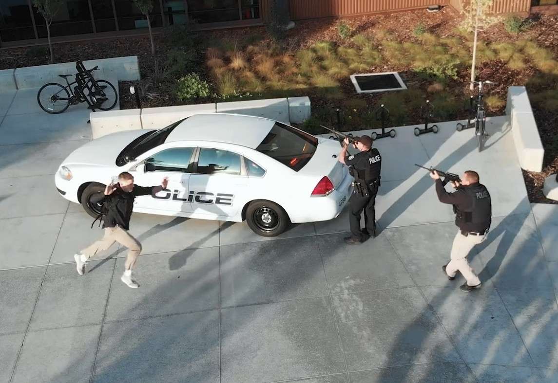 A training video of an active shooter scenario produced by the University of Utah for students, staff and faculty instructs viewers to “run, hide, fight.”