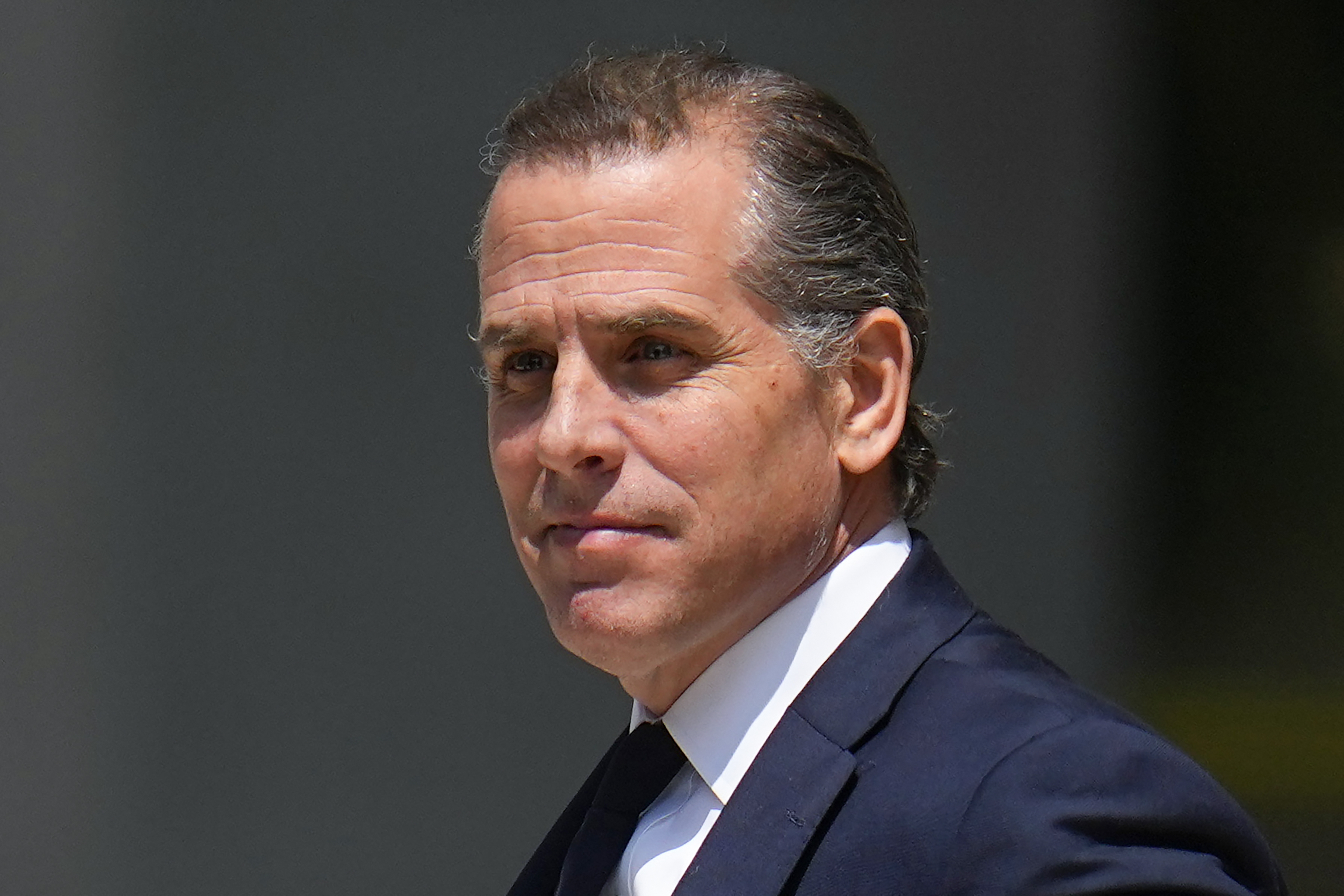President Joe Biden's son, Hunter Biden, leaves after a court appearance, July 26, in Wilmington, Delaware. Hunter Biden was indicted on nine tax charges in California Thursday as a special counsel investigation into the business dealings of the president's son intensifies.