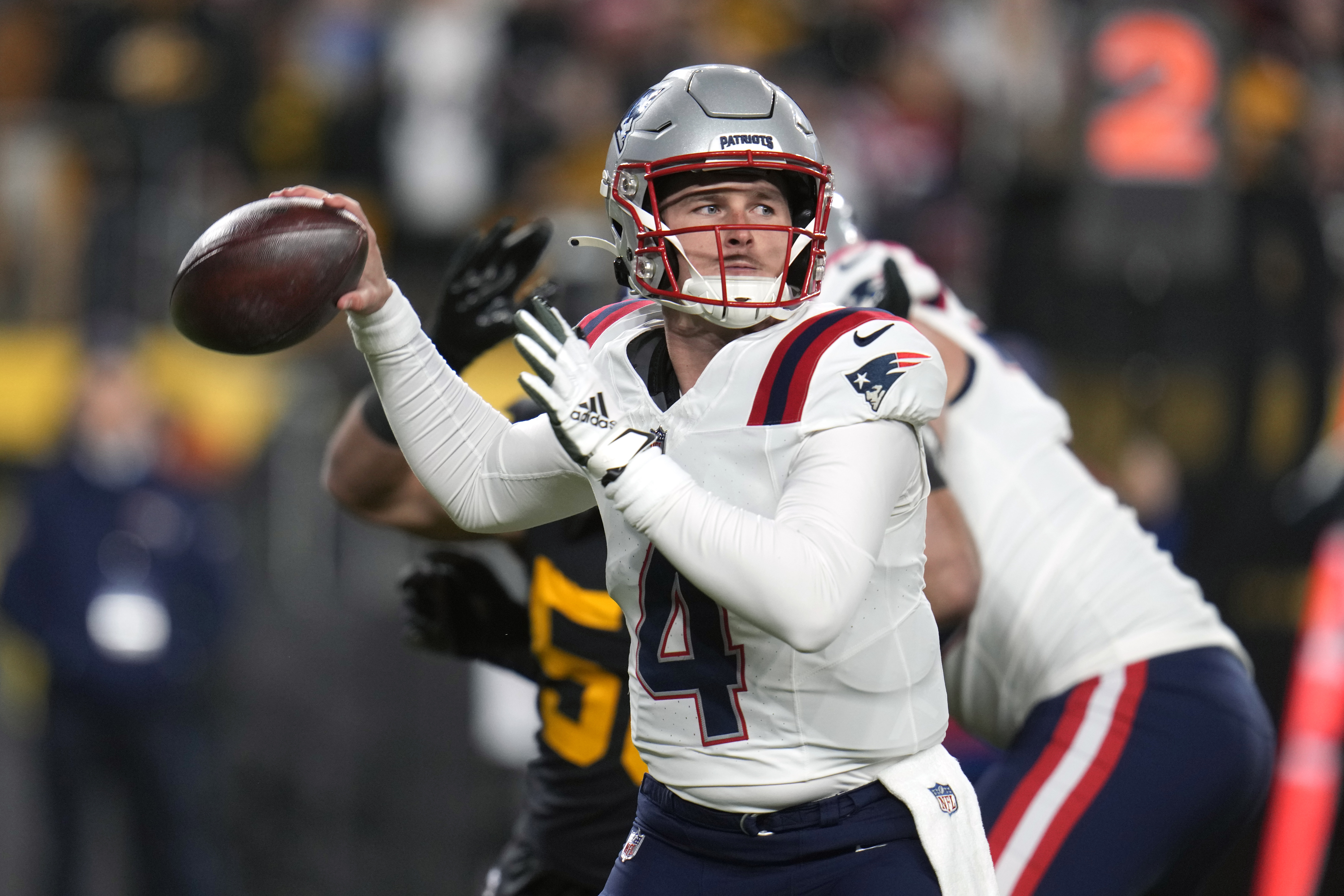 New England Patriots quarterback Bailey Zappe throws during the first half of an NFL football game against the Pittsburgh Steelers on Thursday, Dec. 7, 2023, in Pittsburgh.