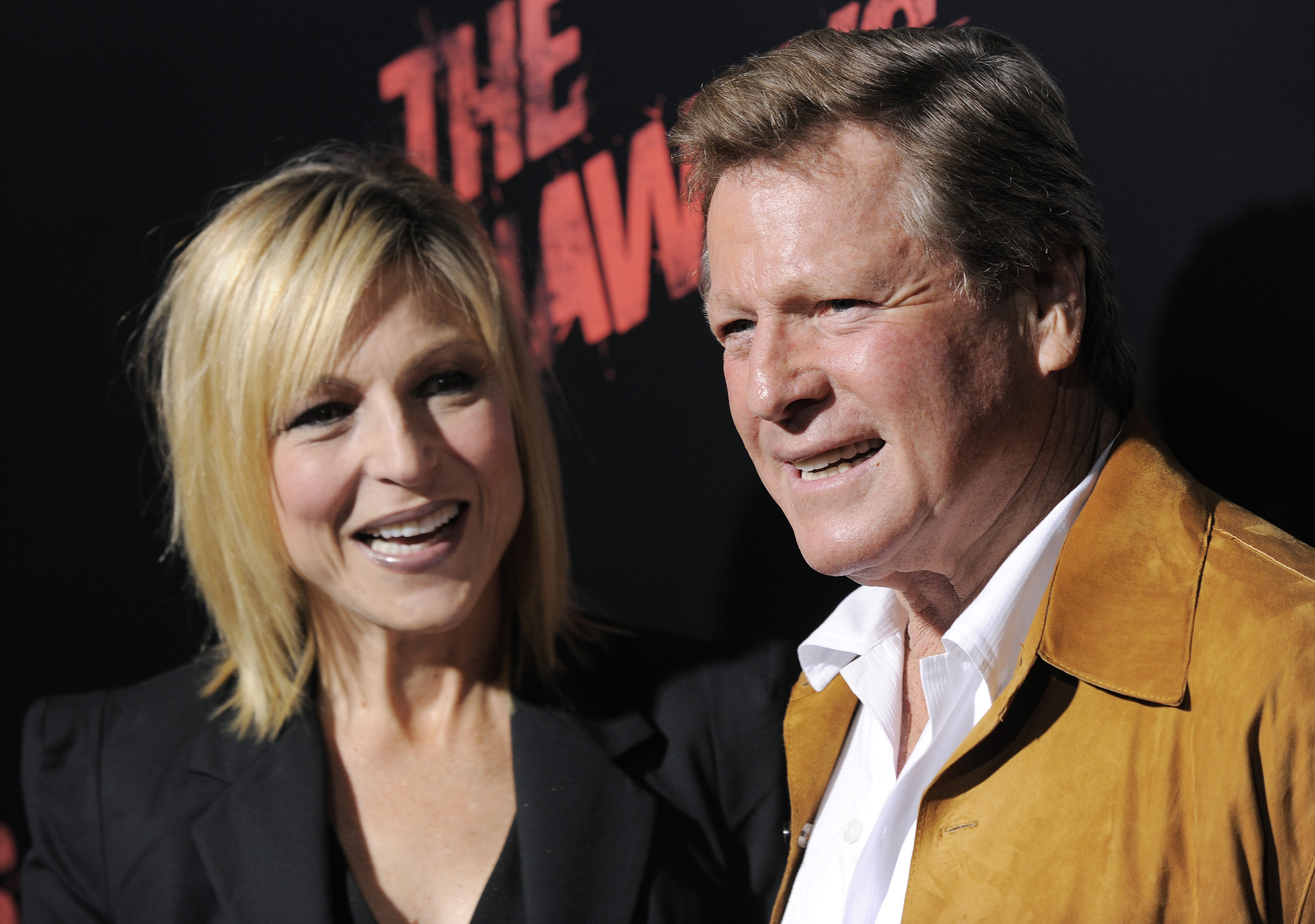 Tatum O'Neal, left, a cast member in "The Runaways," and her father, actor Ryan O'Neal, pose together at the premiere of the film in Los Angeles, March 11, 2010. Ryan O’Neal's son Patrick said on Instagram that his father died Friday.