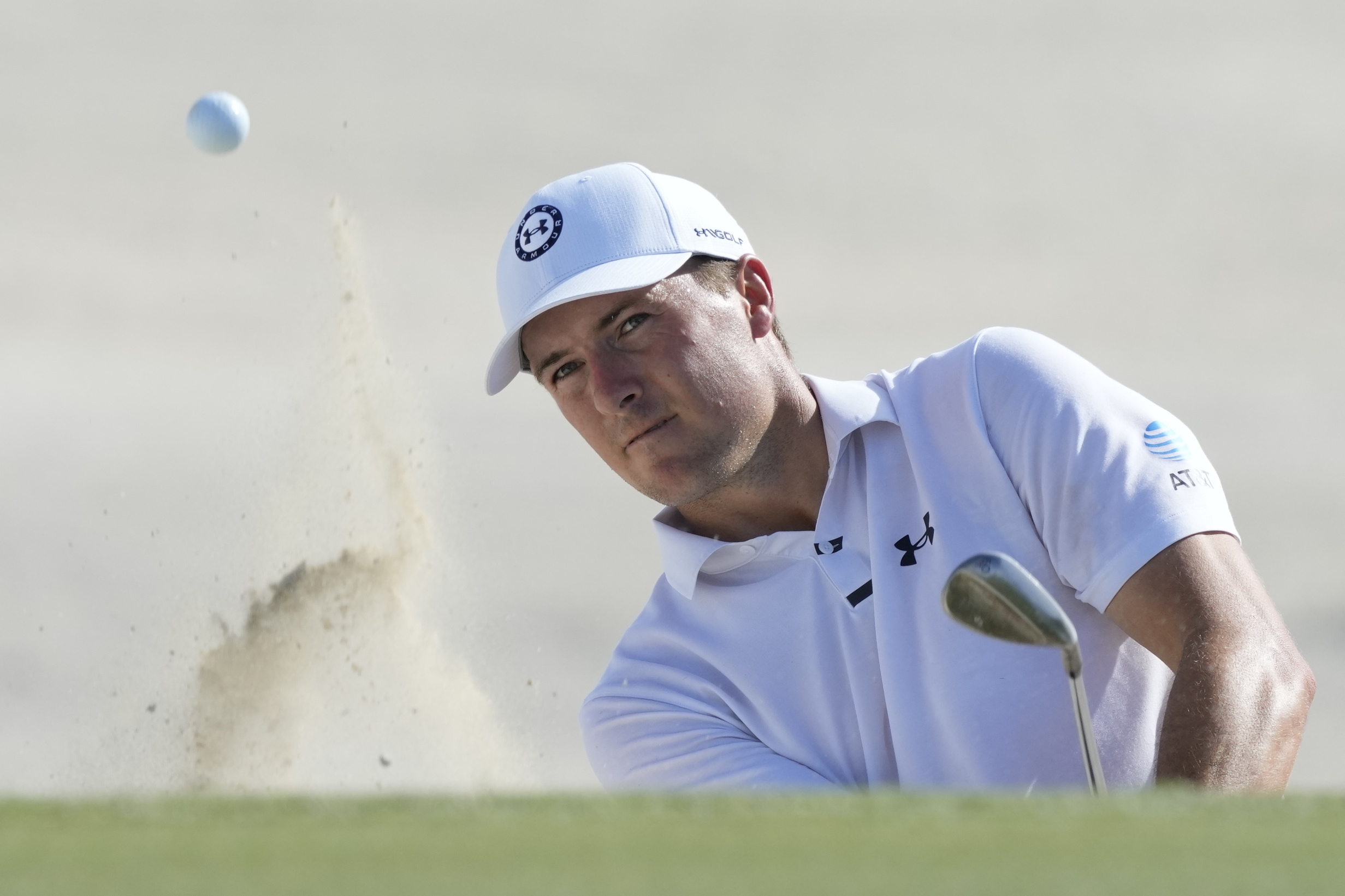 Jordan Spieth, of the United States, watches his hit from the sand on the third hole during the third round of the Hero World Challenge PGA Tour at the Albany Golf Club, in New Providence, Bahamas, Saturday, Dec. 2, 2023.