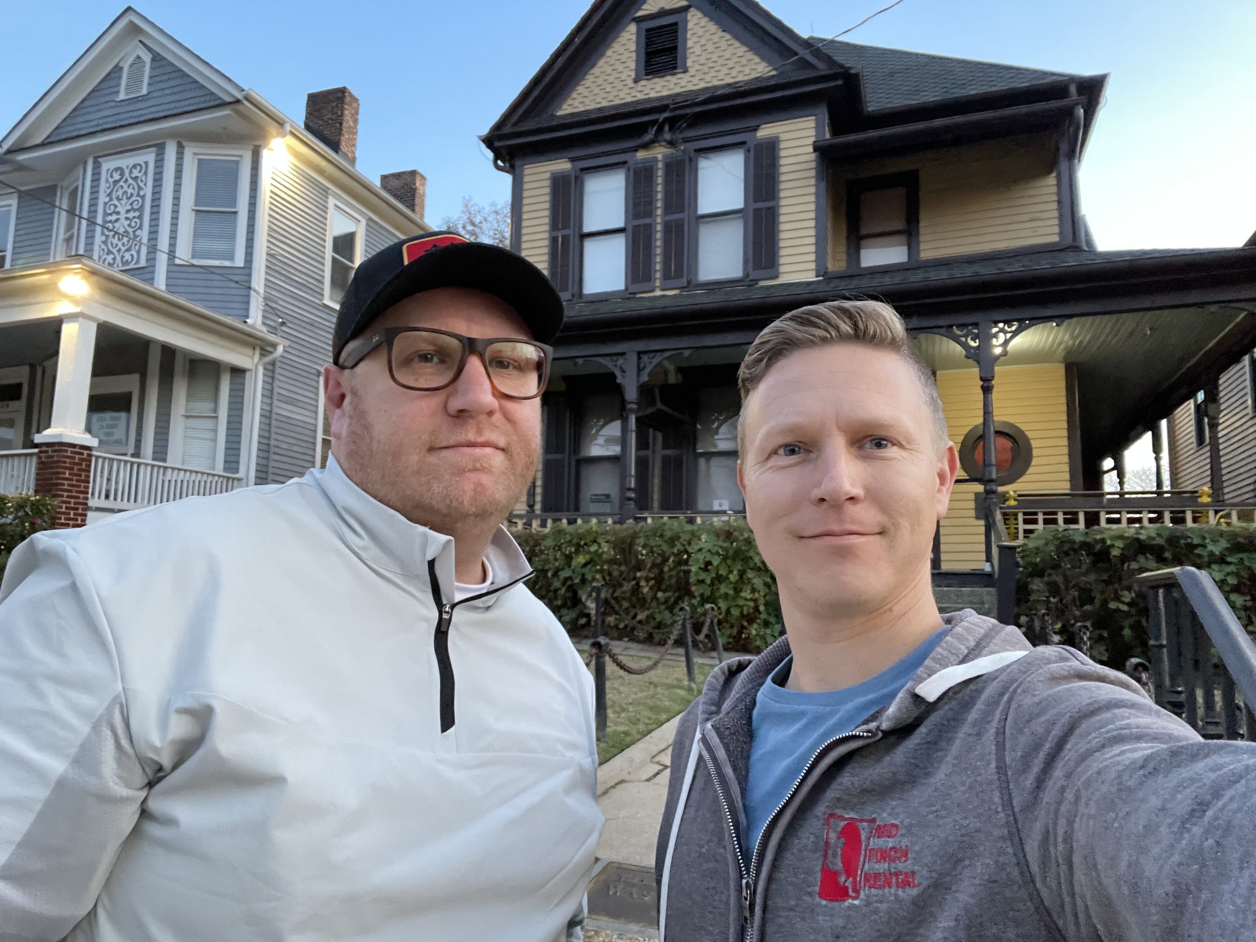 Zach Kempf, left, and Bryce Gandy. The two Utahns were able to prevent a 26-year-old woman from burning down the birth home of Martin Luther King Jr., seen behind them, on Thursday evening.