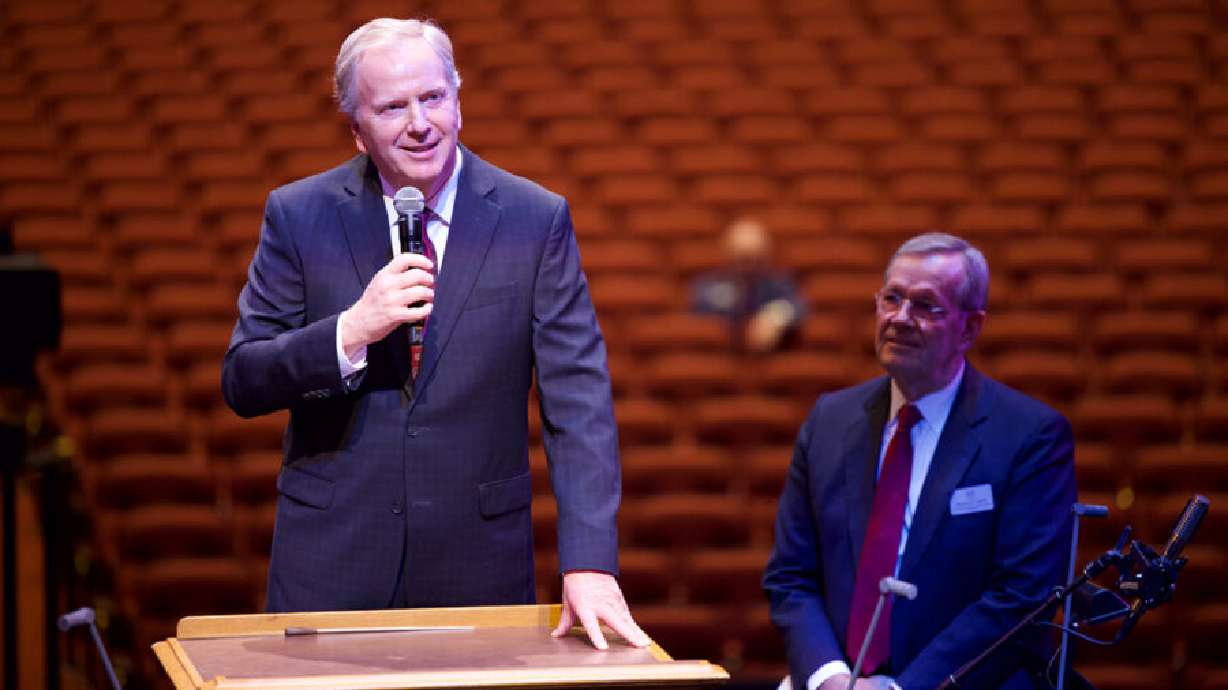 Lloyd D. Newell, the announcer and writer of the Music & the Spoken Word broadcast for the past 34 years, announces on Sunday he has been called with his wife to serve as mission leaders beginning in July 2024. Choir President Michael O. Leavitt sits in the background.