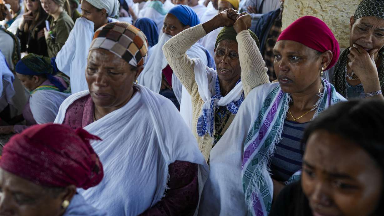 Women mourn during the funeral for Staff Sgt. Aschalwu Sama in Petah Tikva, Israel, Dec. 3. Sama, 20, died of his wounds after he was injured in a ground operation in the Gaza Strip.