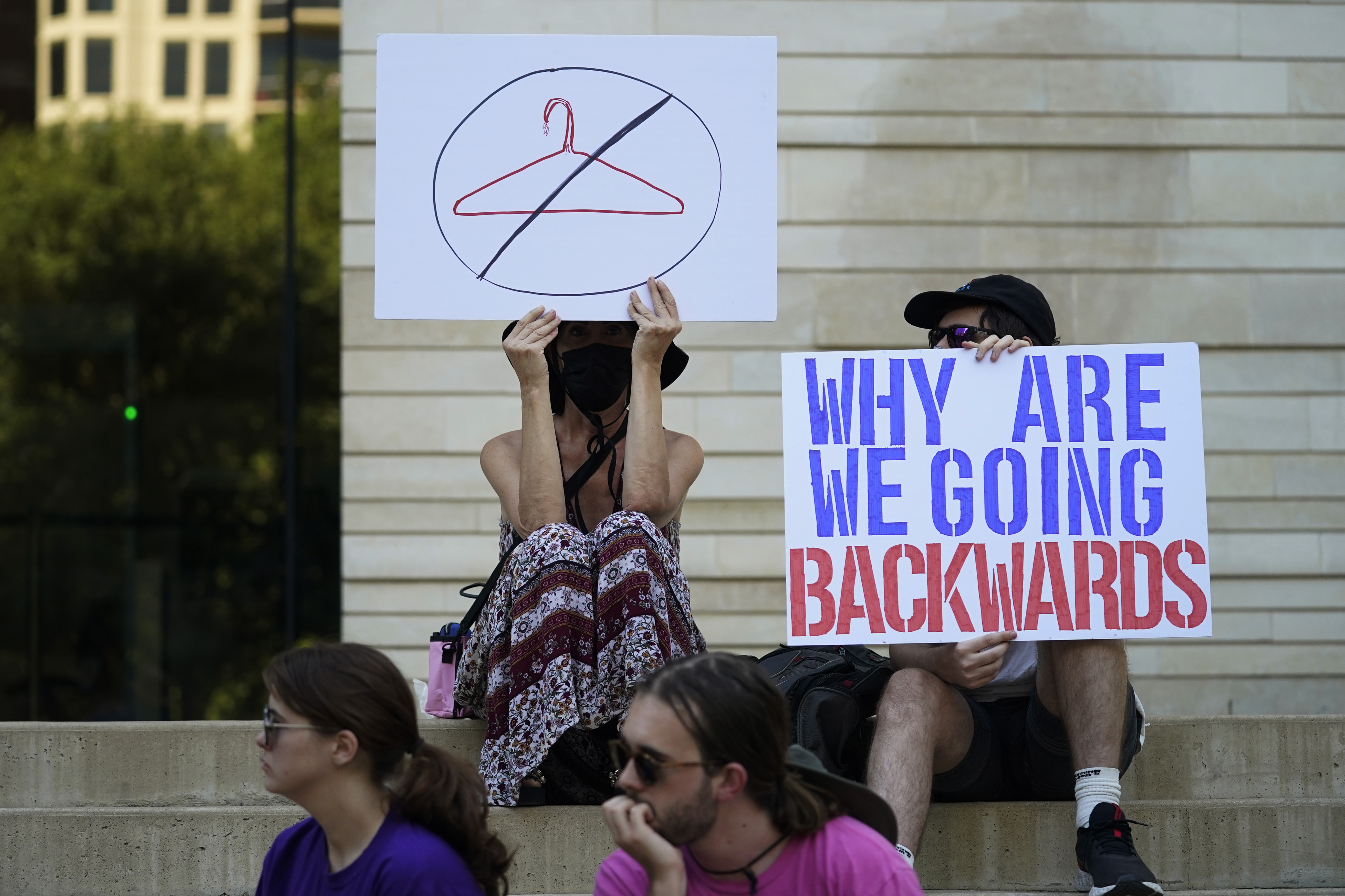 Demonstrators gather at the federal courthouse in Austin, Texas, following the U.S. Supreme Court's decision to overturn Roe v. Wade, June 24, 2022. A pregnant Texas woman whose fetus has a fatal diagnosis asked a court Tuesday to let her terminate the pregnancy.