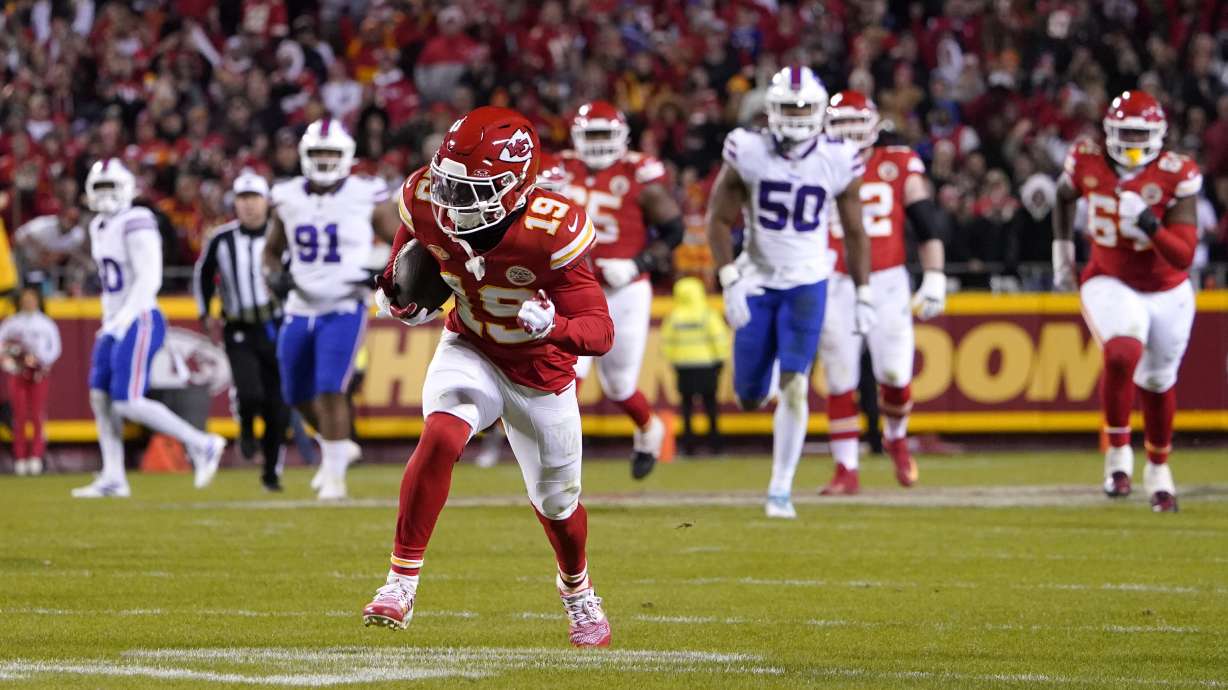 Kansas City Chiefs wide receiver Kadarius Toney runs to the end zone after catching a lateral by teammate Travis Kelce during the second half of an NFL football game against the Buffalo Bills Sunday, Dec. 10, 2023, in Kansas City, Mo. The play was nullified after Toney was called for being offside on the play.