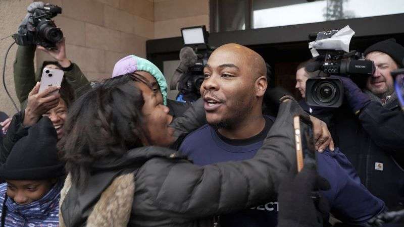 Marvin Haynes, 35, is hugged by a supporter as he walks out of the Minnesota Correctional Facility at Stillwater in Bayport, Minn. on Monday after a judge set aside his murder conviction in the 2004 killing of a man at a Minneapolis flower shop. Haynes was 16 when Randy Sherer, 55, was killed during a robbery.