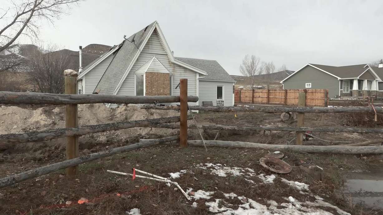 A delivery driver is being credited with saving a home in Box Elder County last Friday.