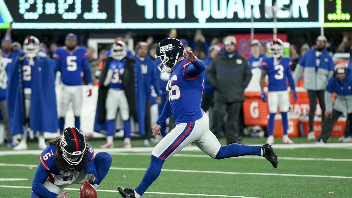 New York Giants place kicker Randy Bullock (46) kicks a field goal against the Green Bay Packers with one second remaining during the fourth quarter of an NFL football game, Monday, Dec. 11, 2023, in East Rutherford, N.J. The kick was good giving the Giants the win.