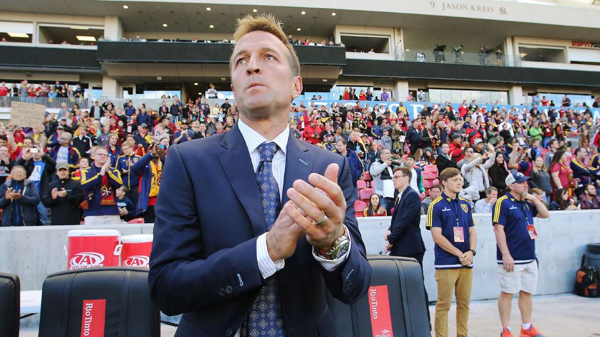 New York FC coach Jason Kreis applauds his team prior to the game with Real Salt Lake in MLS action in Sandy Saturday, May 23, 2015.