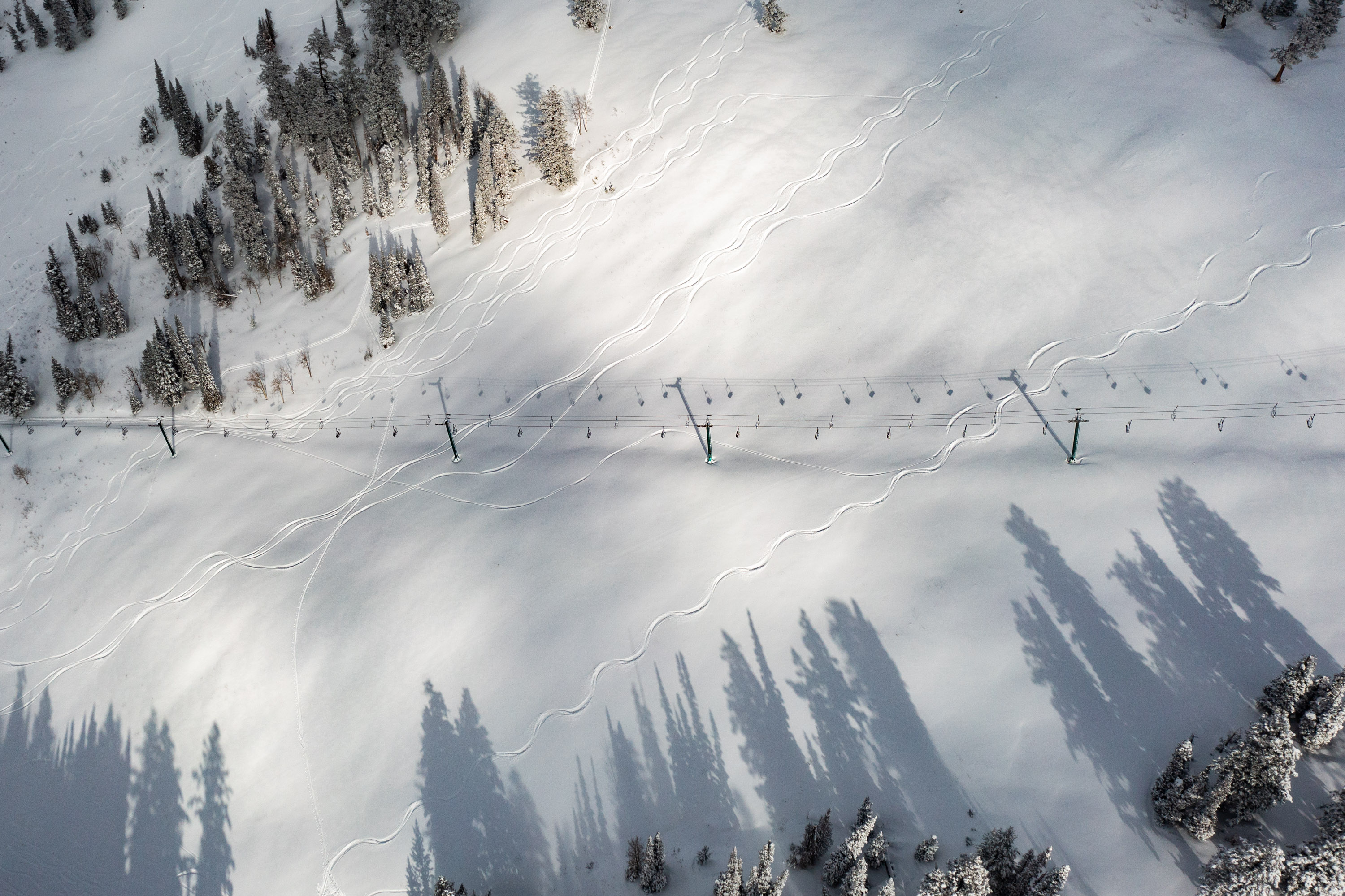 A photo of a Powder Mountain lift on Nov. 20, 2022. Reed Hastings, its majority owner, said Tuesday the resort will switch to a mix of private and public skiing availability beginning next winter.