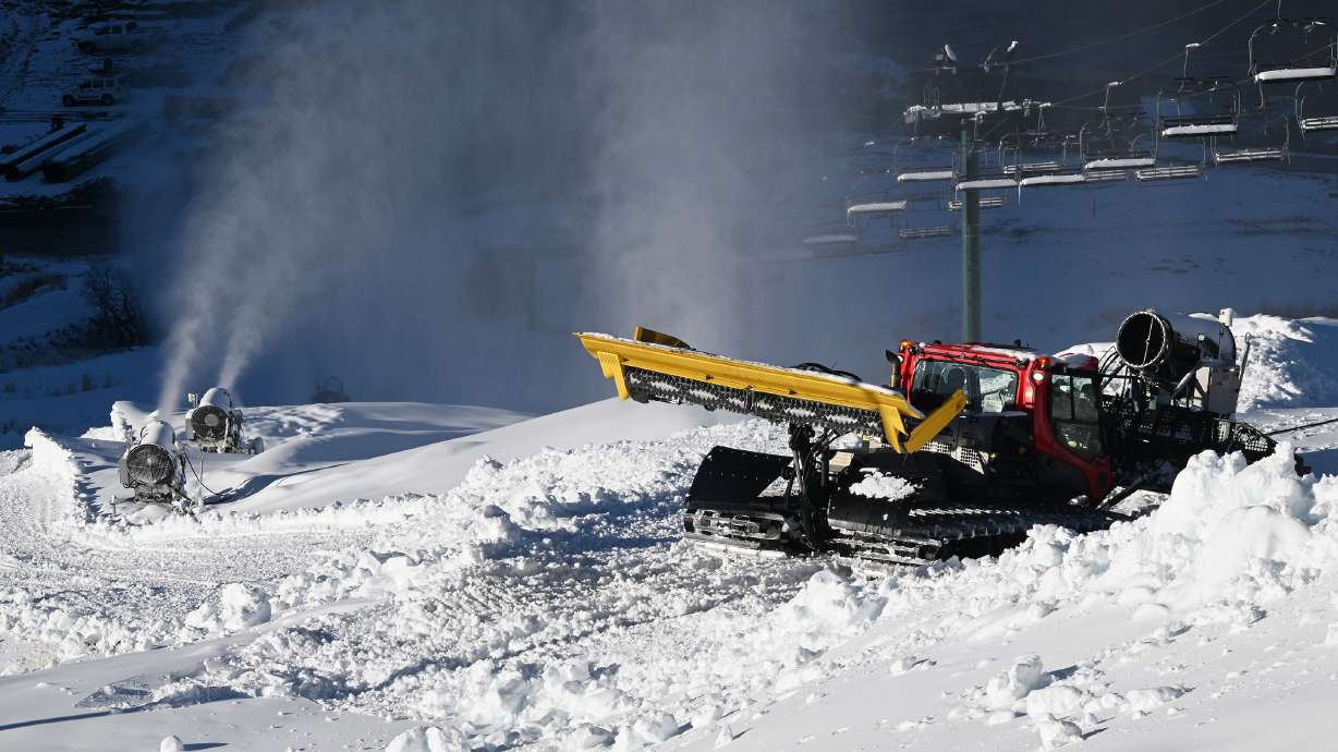 Human-made snow is blown onto the mountain at the Utah Olympic Park in Park City on Nov. 27.