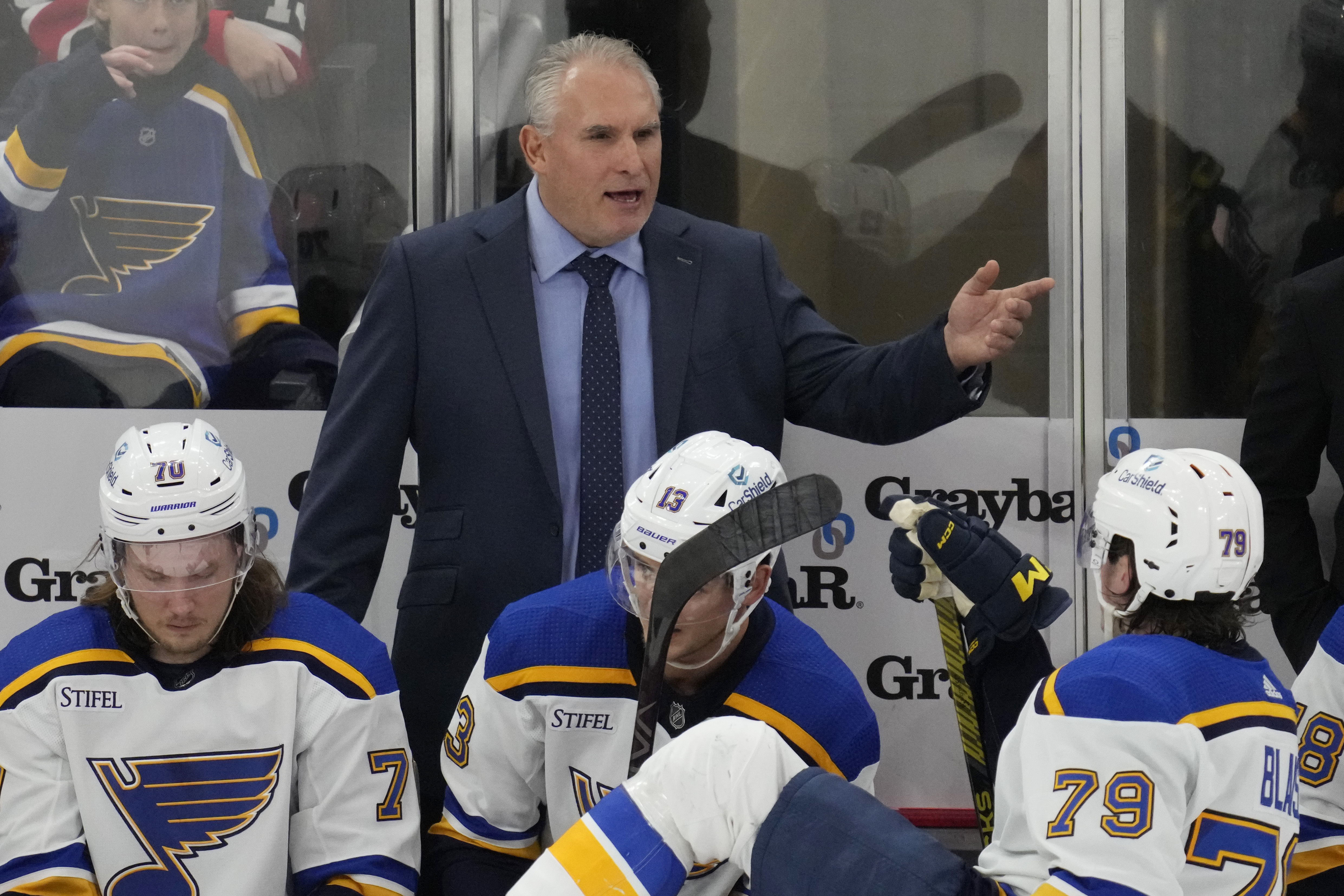 St. Louis Blues head coach Craig Berube talks to players during the third period of an NHL hockey game against the Chicago Blackhawks in Chicago, Sunday, Nov. 26, 2023. 