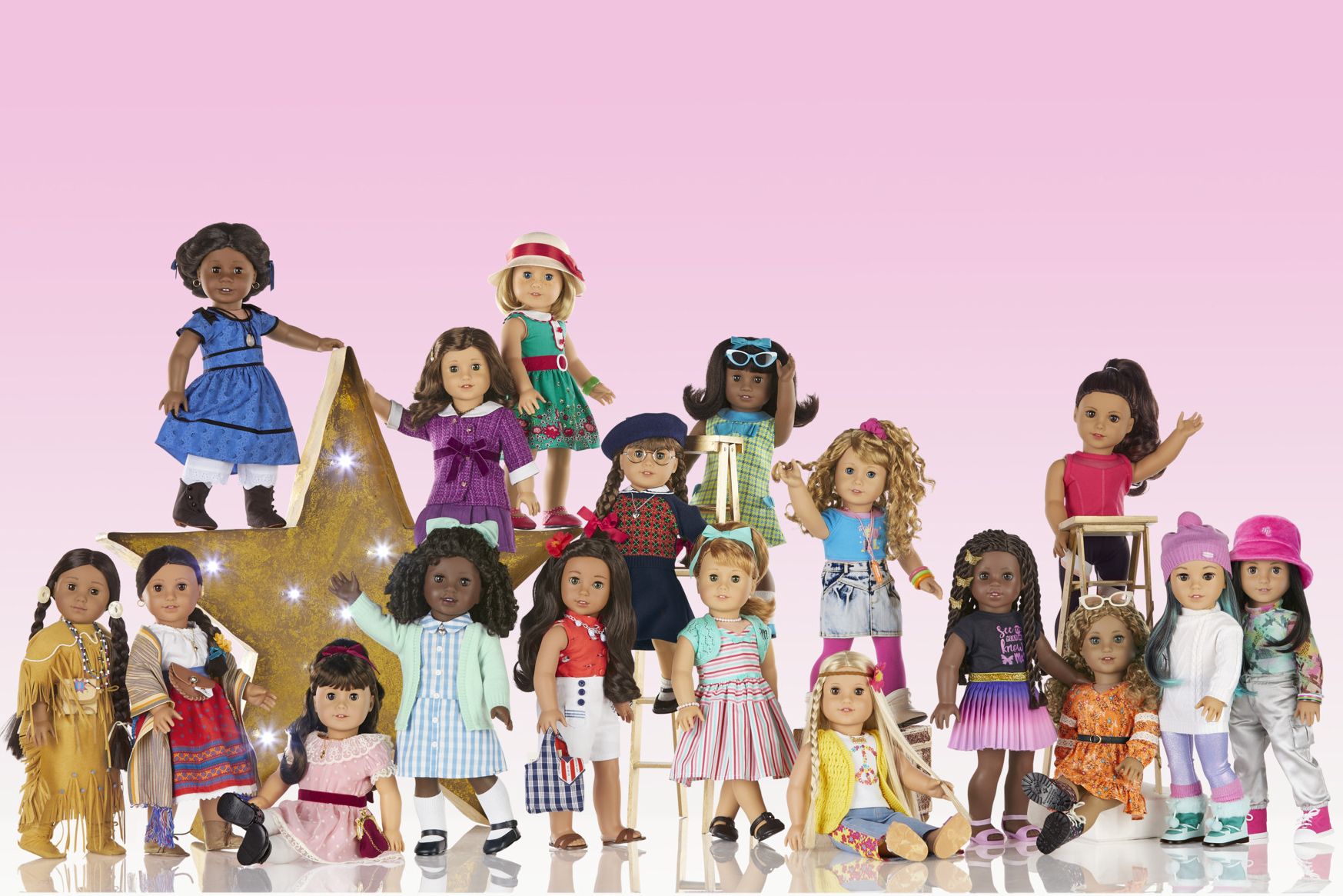 This image shows a variety of American Girl dolls. The toy company Mattel is developing a live-action film based on its American Girl doll line.