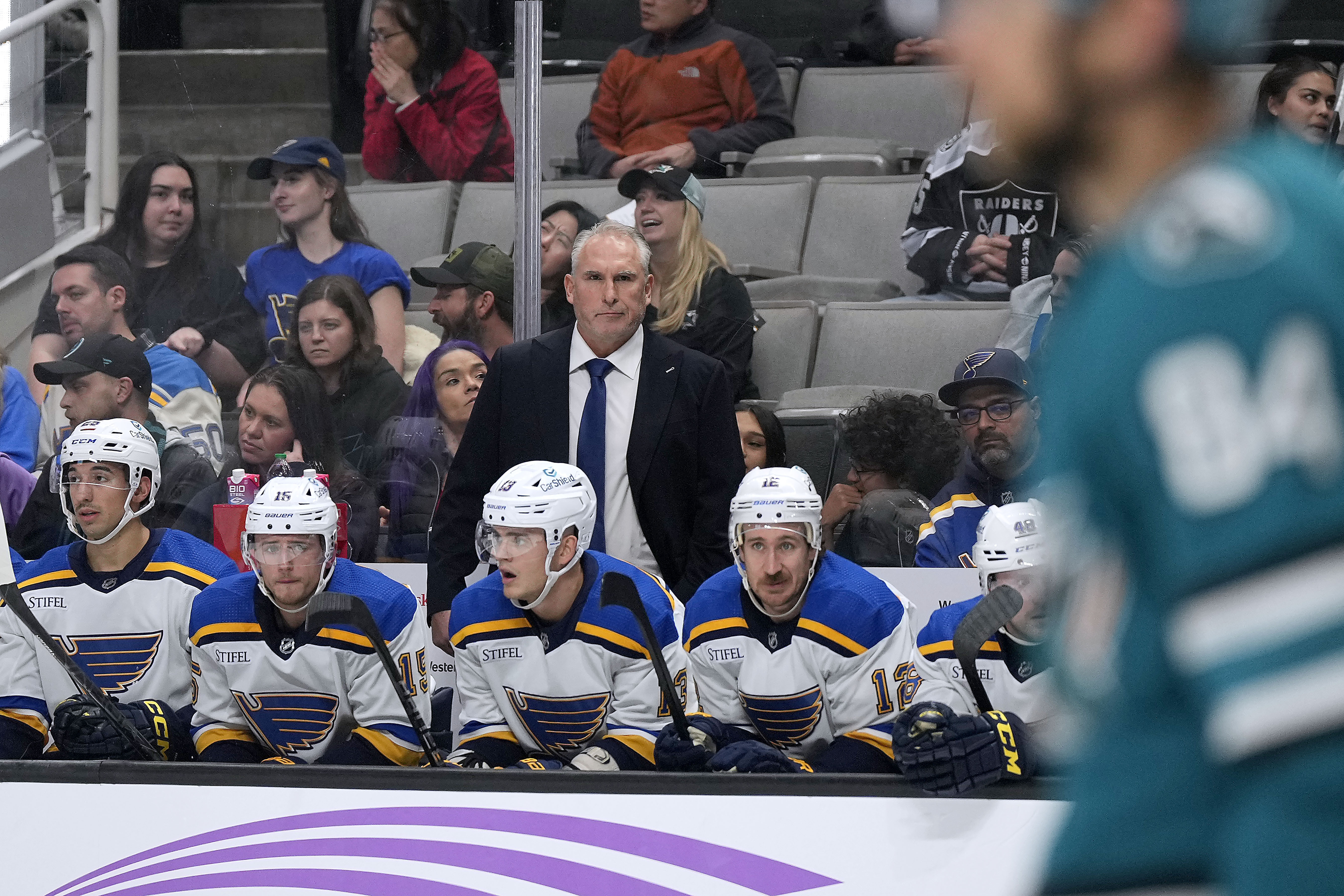 St. Louis Blues coach Craig Berube watches from the beach during the first period of the team's NHL hockey game against the San Jose Sharks on Thursday, Nov. 16, 2023, in San Jose, Calif.