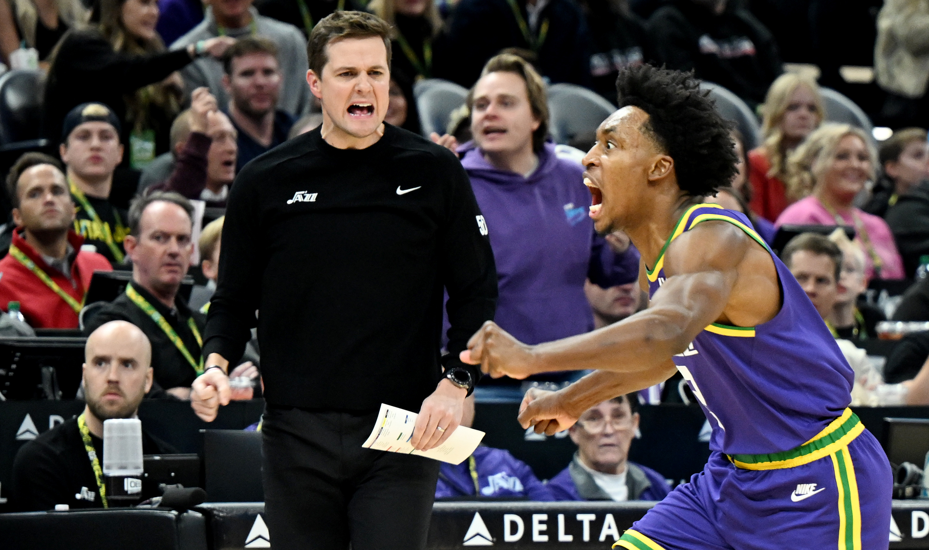 Utah Jazz guard Collin Sexton (2) and Utah Jazz Head Coach Will Hardy celebrate after Sexton forced a backcourt turnover as the Utah Jazz and the New York Knicks play at the Delta Center in Salt Lake City on Wednesday, Dec. 13, 2023.