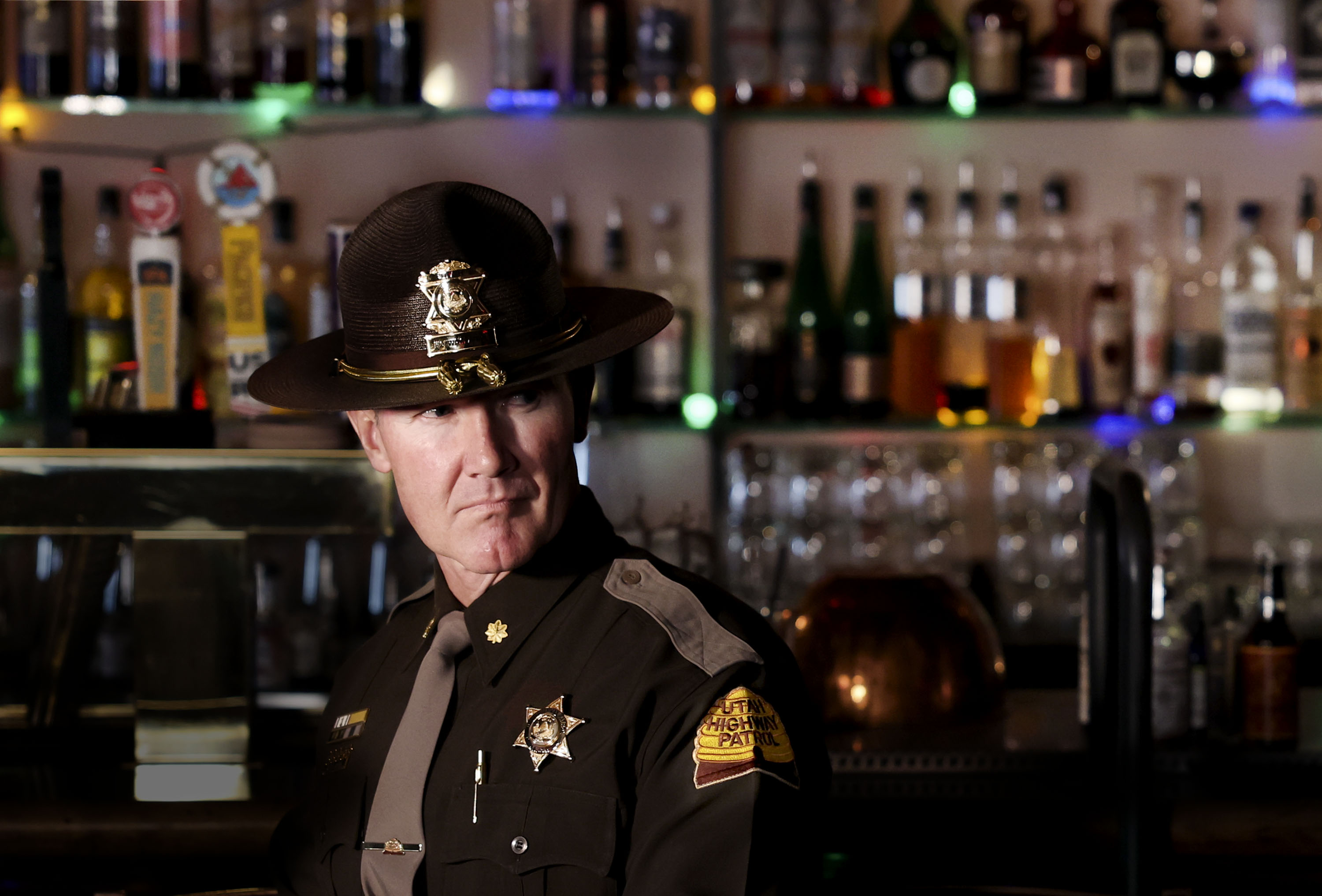 Utah Highway Patrol Maj. Steve Salas stands inside Bar X during a press conference urging drivers to add a sober ride to their winter holiday plans in Salt Lake City on Thursday.
