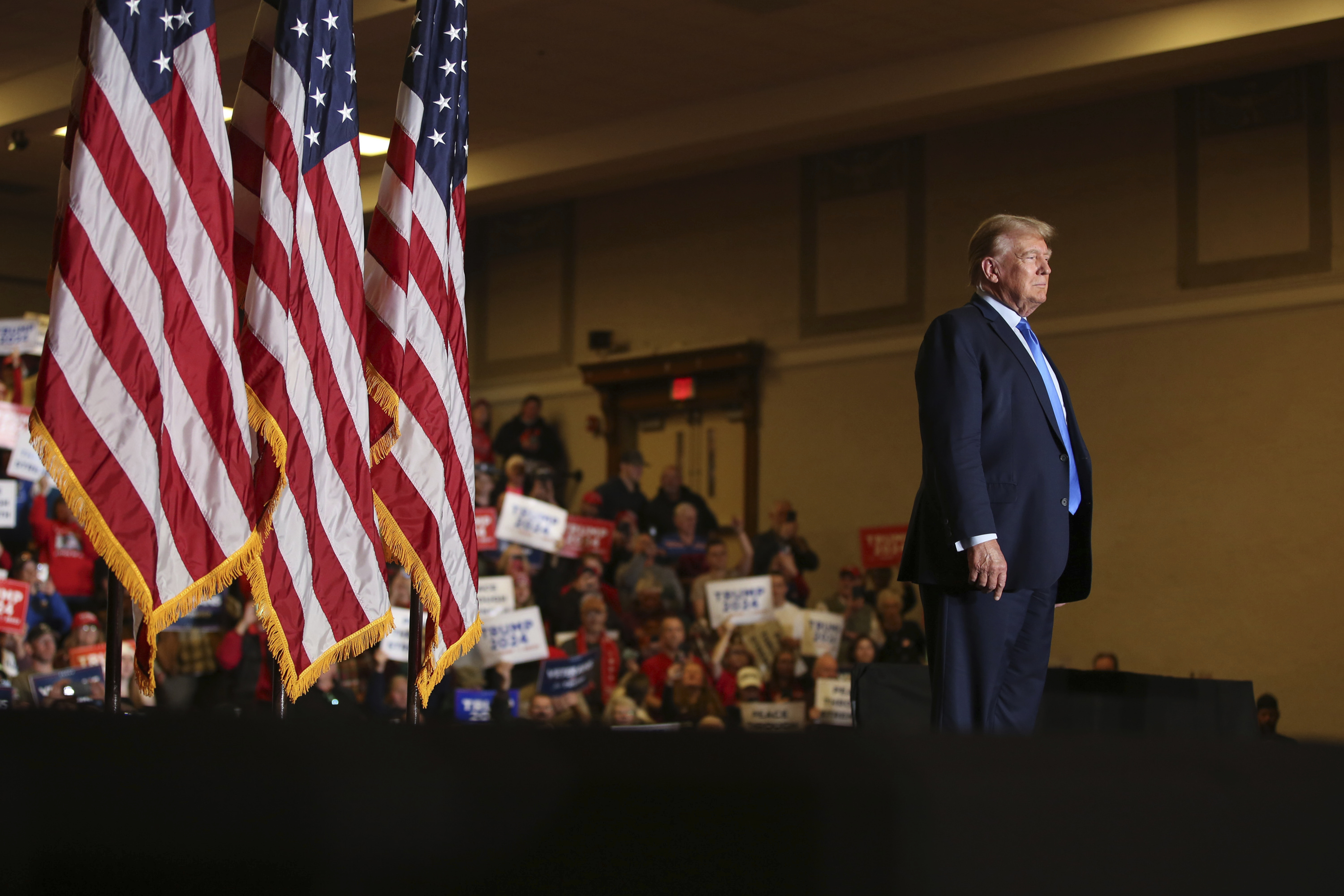 Former President Donald Trump greets the crowd at a campaign rally Nov. 11 in Claremont, N.H. The Michigan Court of Appeals won't stop Trump from appearing on the state's 2024 Republican primary ballot after critics argued that Trump's role in the 2021 attack on the U.S. Capitol disqualifies him.