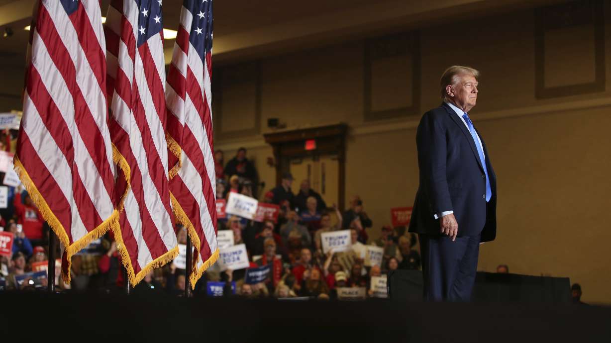 Former President Donald Trump greets the crowd at a campaign rally Nov. 11 in Claremont, N.H. The Michigan Court of Appeals won't stop Trump from appearing on the state's 2024 Republican primary ballot after critics argued that Trump's role in the 2021 attack on the U.S. Capitol disqualifies him.