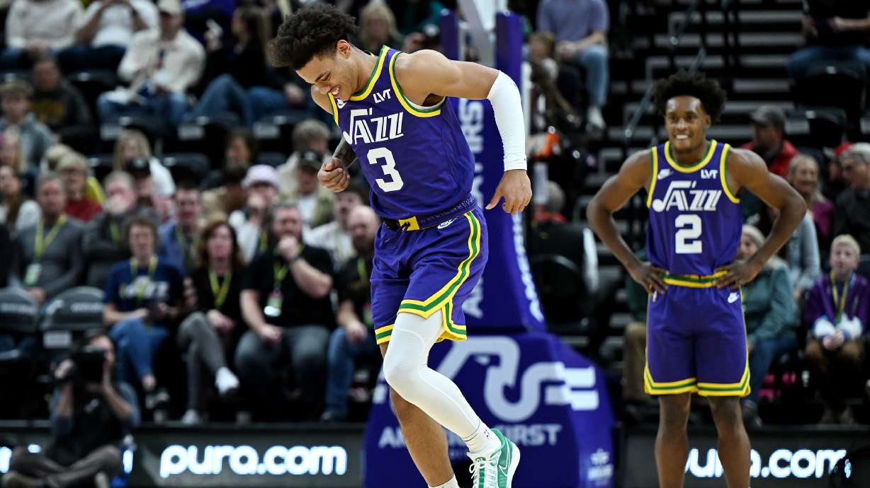 Utah Jazz guard Keyonte George (3) hops in pain after suffering an apparent injury as the Utah Jazz and the New York Knicks play at the Delta Center in Salt Lake City on Wednesday, Dec. 13, 2023. George took himself out of the game and left the floor.