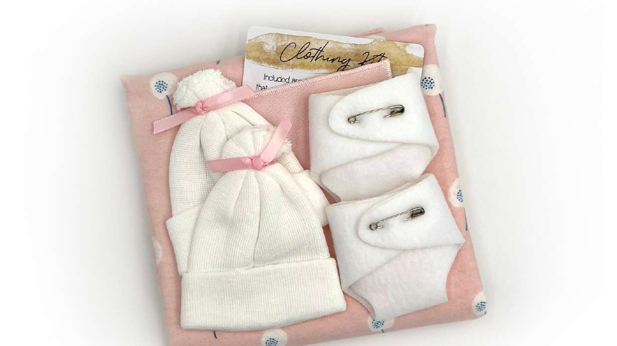 Clothing kits are created for infants lost through stillbirth or miscarriage and are provided by the Carry You Foundation to help bereaved families in St. George, Tuesday.