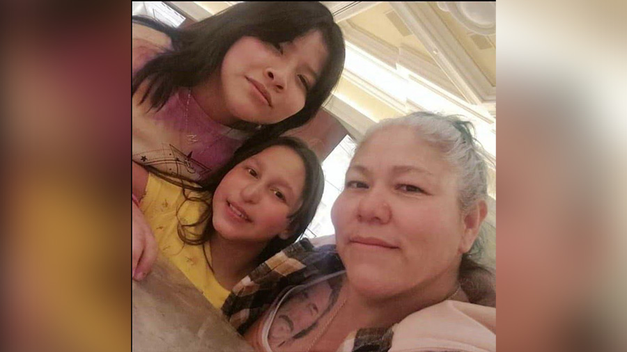 Karina Marquez (left) with her family.