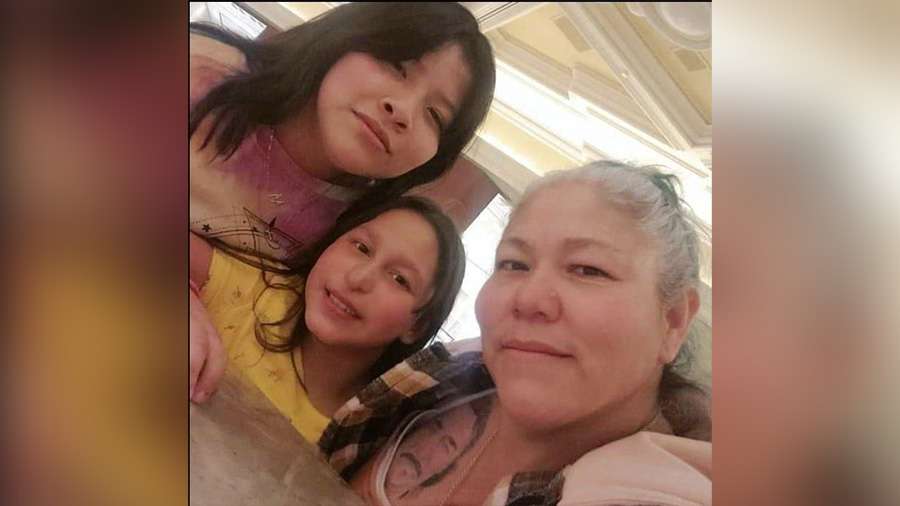 Karina Marquez (left) with her family.
