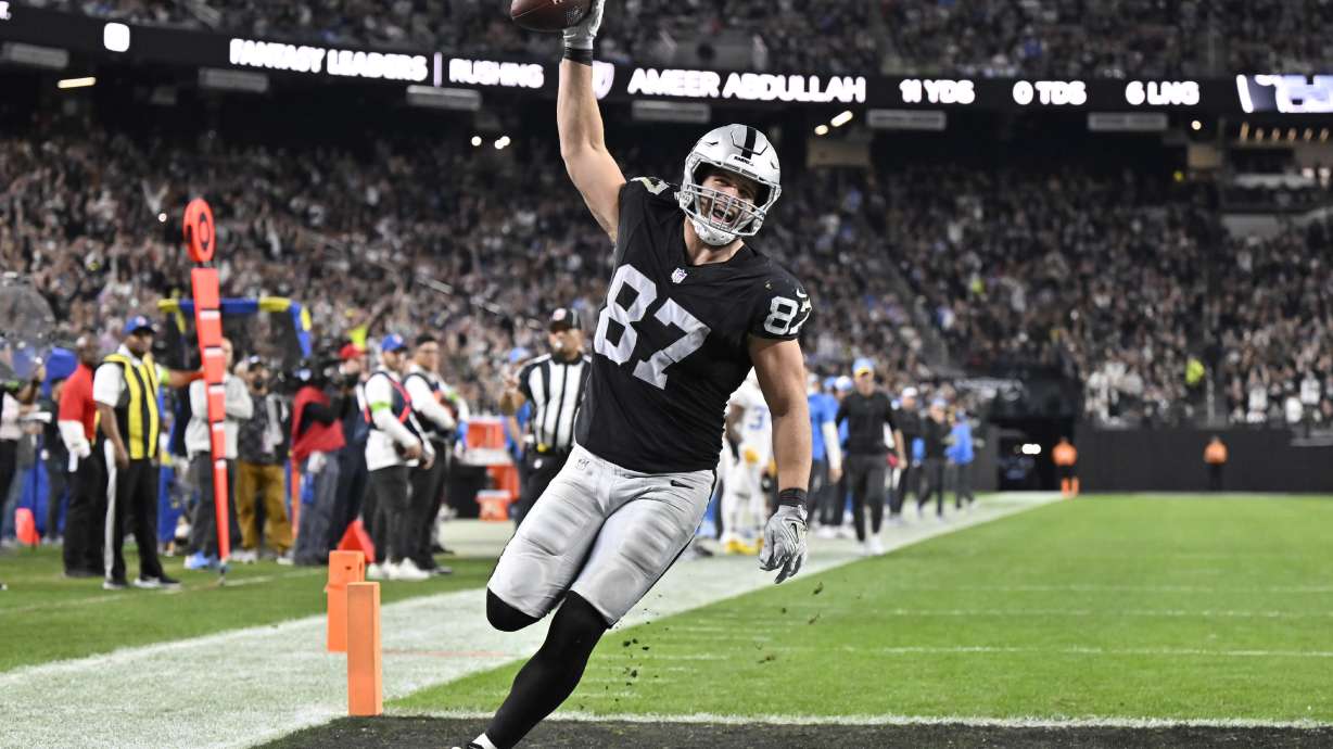 Las Vegas Raiders tight end Michael Mayer (87) celebrates after scoring a touchdown against the Los Angeles Chargers during the first half of an NFL football game, Thursday, Dec. 14, 2023, in Las Vegas.
