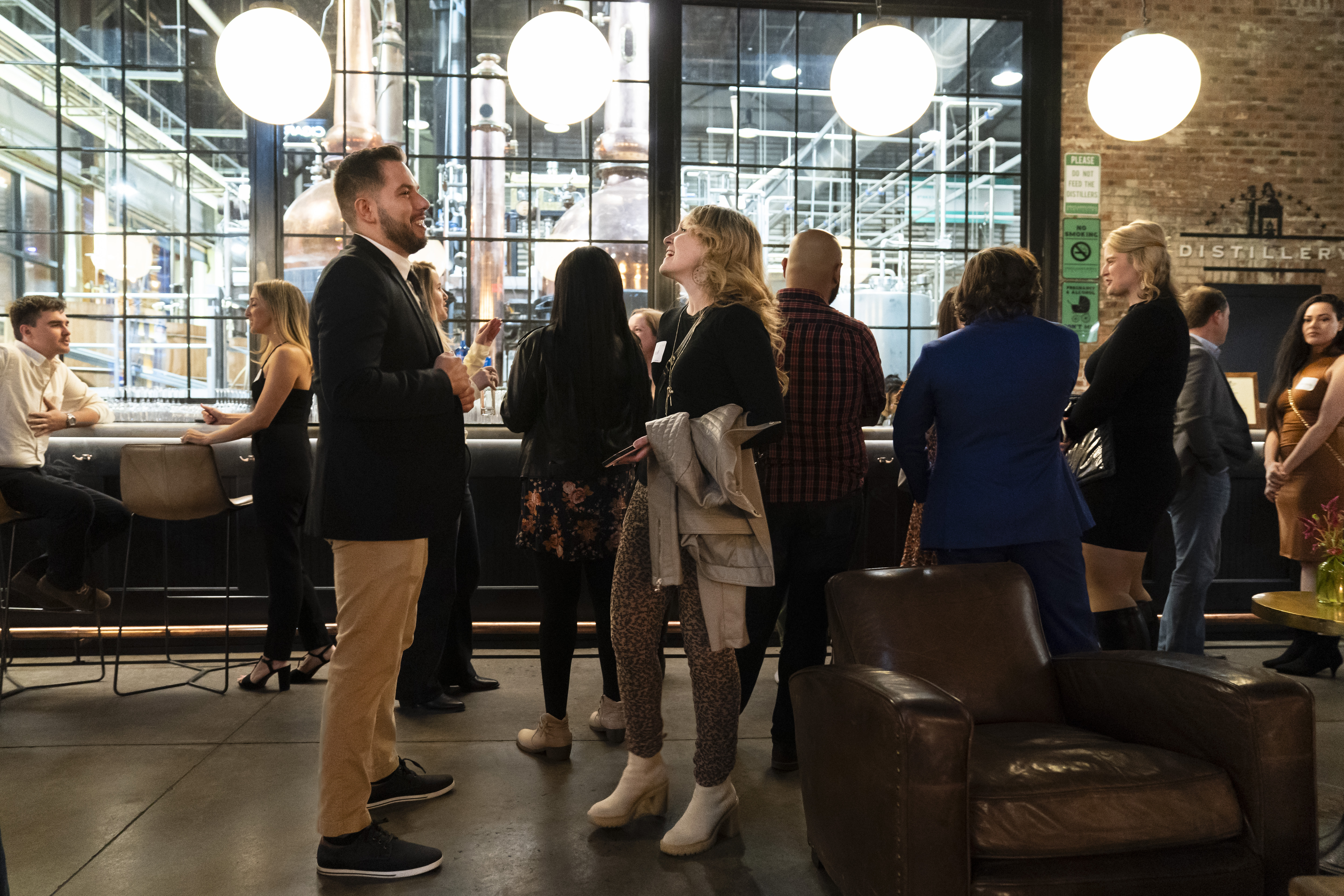 People mingle at a Philadelphia Distilling Daters Mixer in Philadelphia, Nov. 14. Some of the most populous urban areas in the U.S. have an imbalanced sex ratio.