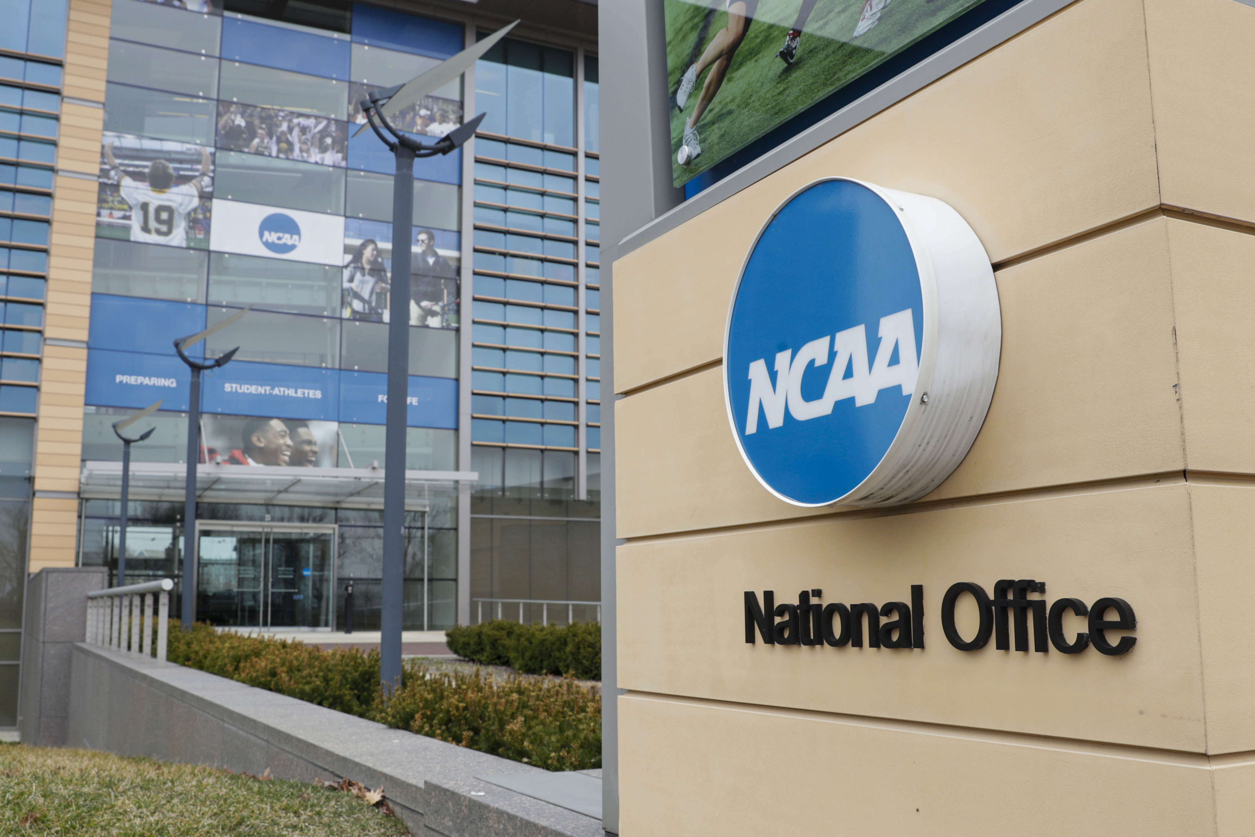 FILE - The NCAA headquarters in Indianapolis is shown in this Thursday, March 12, 2020, file photo. College athletes who were denied the chance to play immediately after transferring a second time can return to competition — for now — after a federal judge issued a 14-day temporary restraining order Wednesday, Dec. 13, 2023, against the NCAA. 