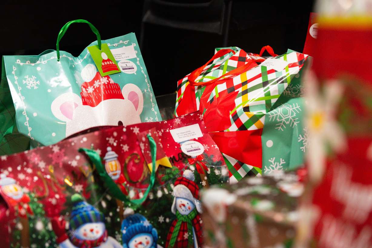 Presents for the Santa to a Senior program are gathered in an office at Home Instead in West Jordan on Thursday.