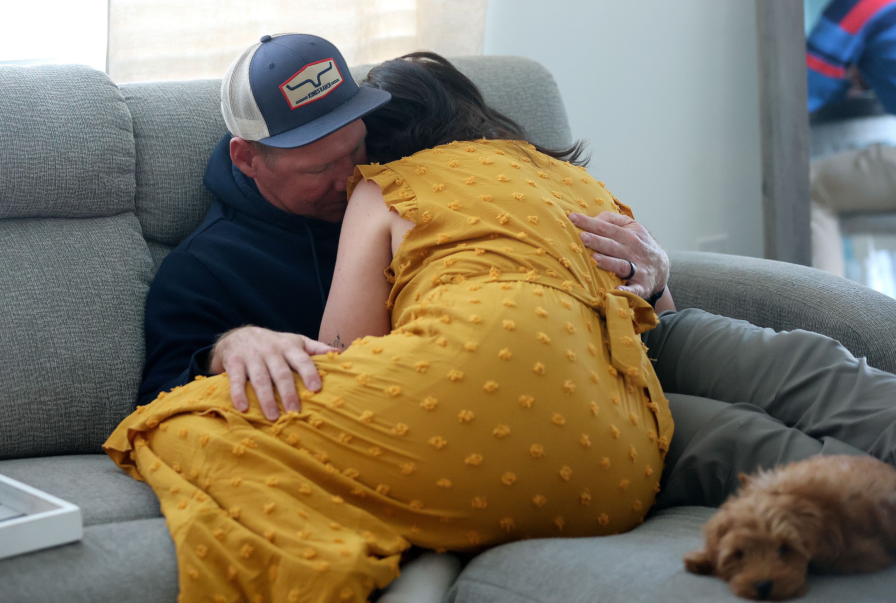 Andrew comforts his wife Lyndsey as she takes a break from an interview about surviving domestic violence in her previous relationship at their home in Santaquin on Oct. 24.