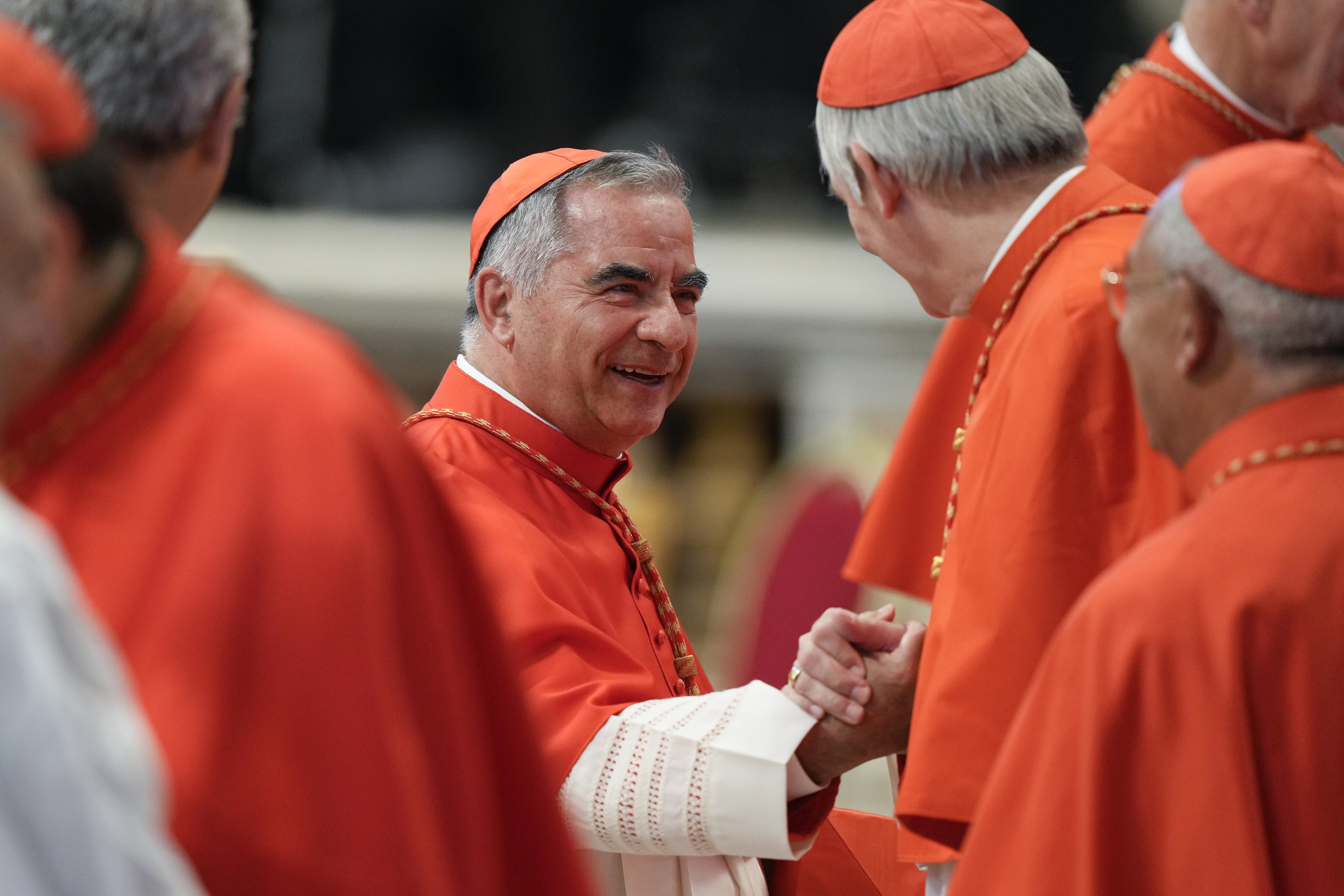 Cardinal Angelo Becciu attends a consistory inside St. Peter's Basilica, at the Vatican, on Aug. 27, 2022. Lawyers for the once-powerful cardinal have accused Vatican prosecutors of being "prisoners to their completely shattered theory" in closing arguments of a two-year trial.