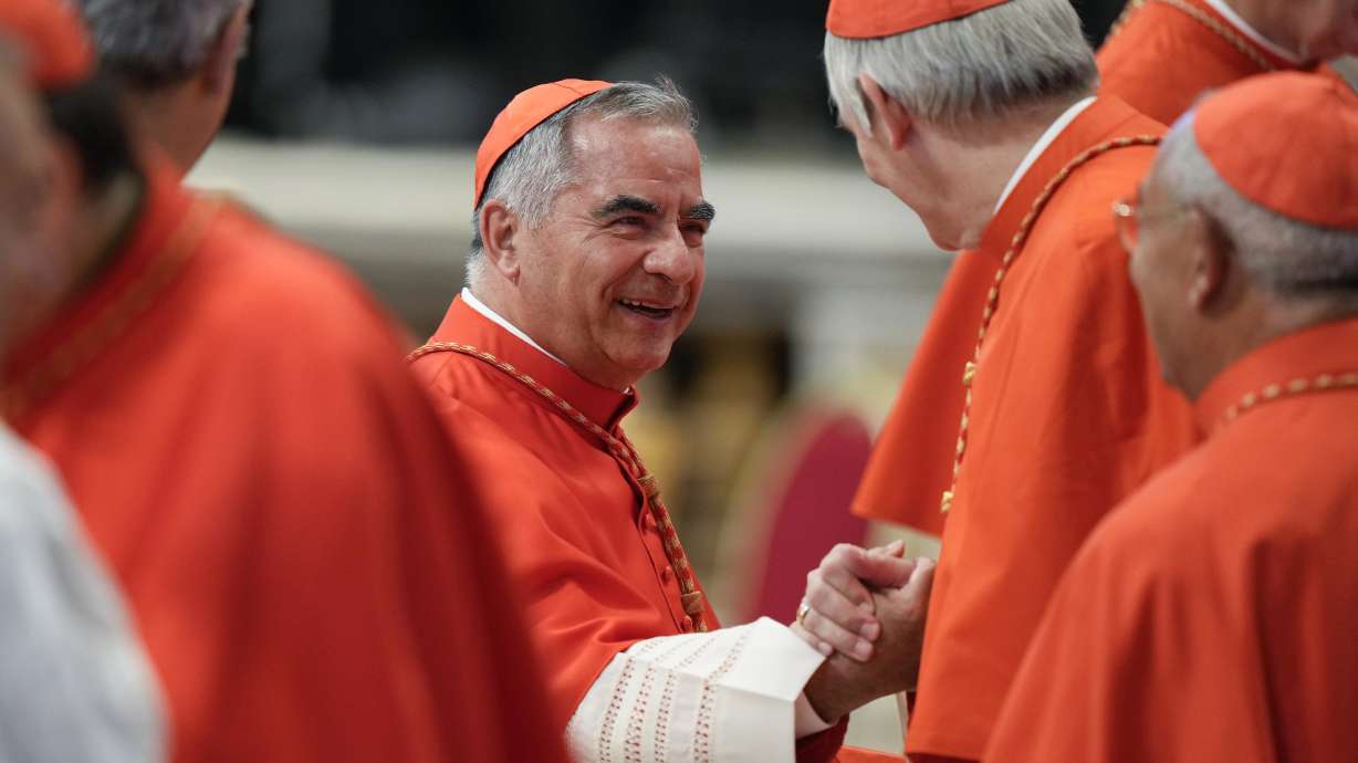 Cardinal Angelo Becciu attends a consistory inside St. Peter's Basilica, at the Vatican, on Aug. 27, 2022. Lawyers for the once-powerful cardinal have accused Vatican prosecutors of being "prisoners to their completely shattered theory" in closing arguments of a two-year trial.