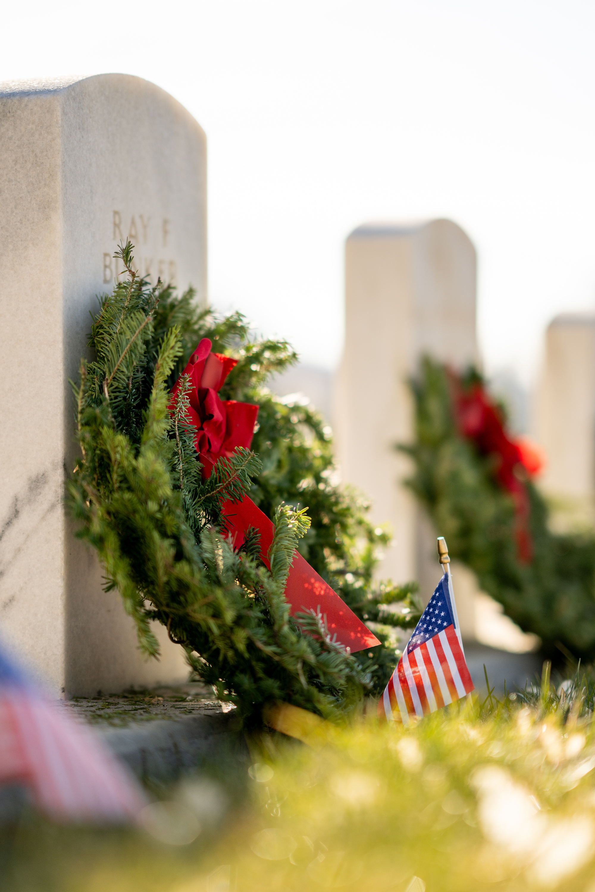 Wreaths are laid on veterans’ graves as part of the Wreaths Across America program at the Salt Lake City Cemetery in Salt Lake City on Saturday.